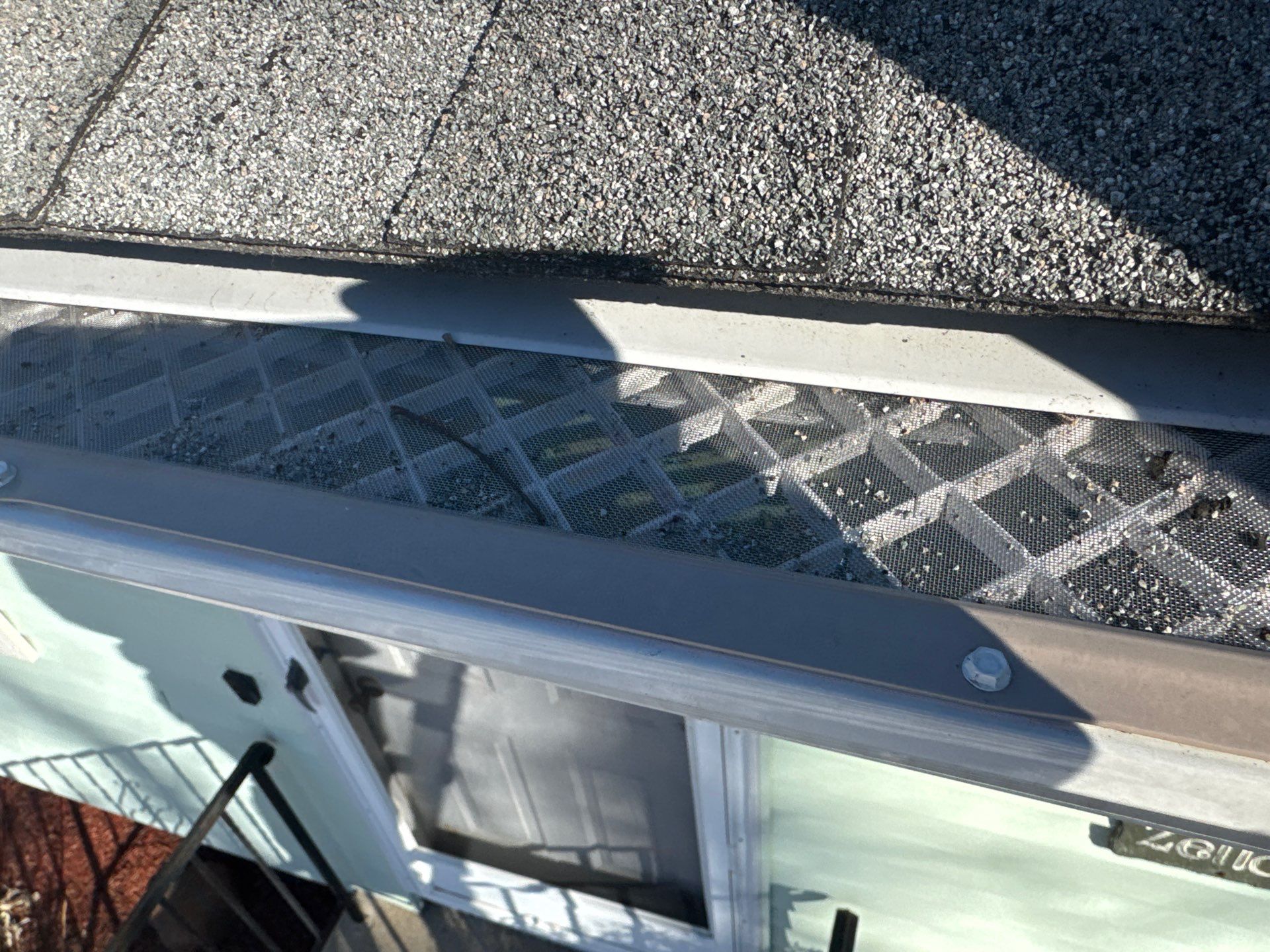Ice Dam Removal using GAF by Manny Construction LLC