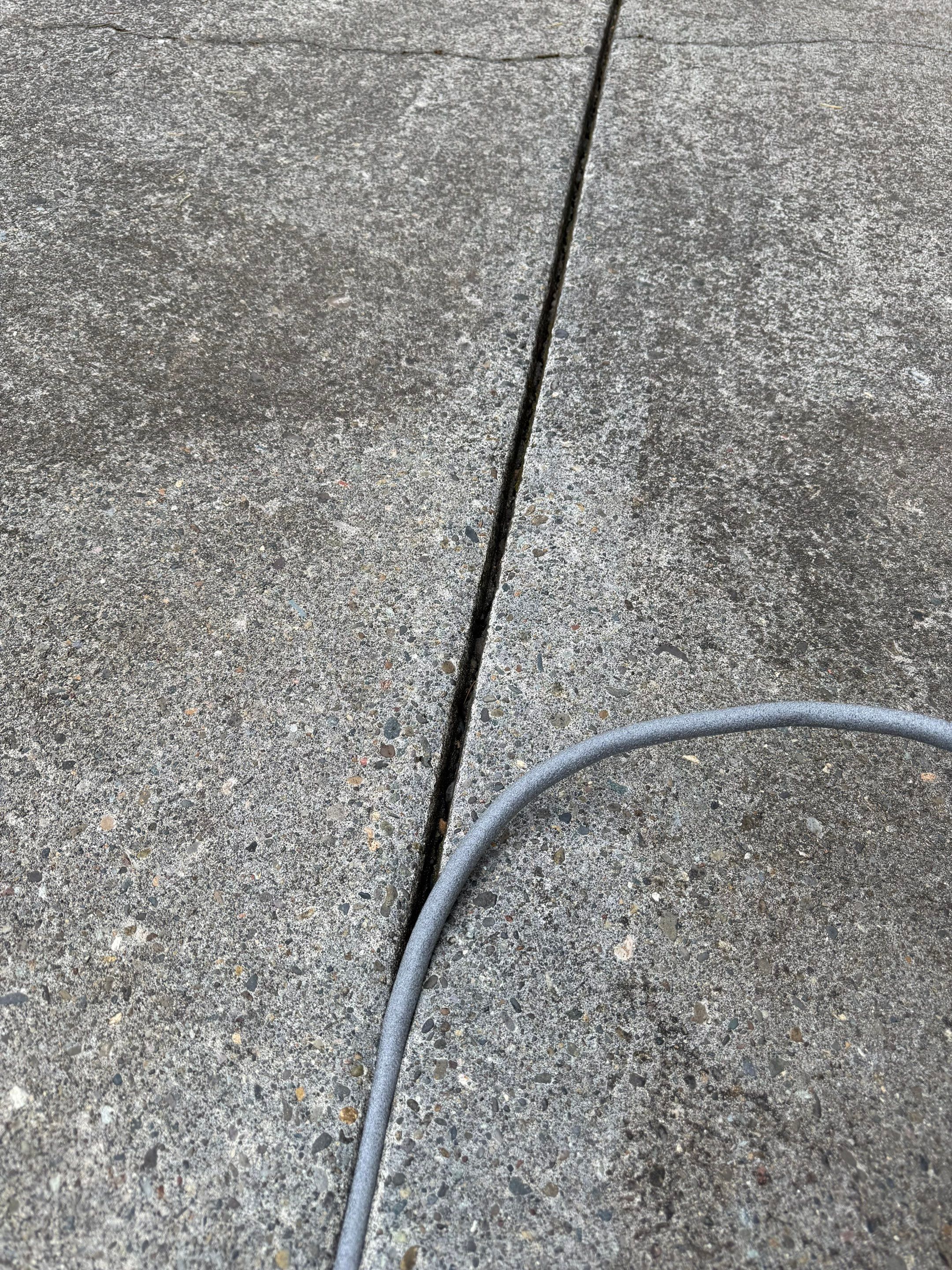 Driveway Expansion Joint Repair & Sealing by Handyman State LLC