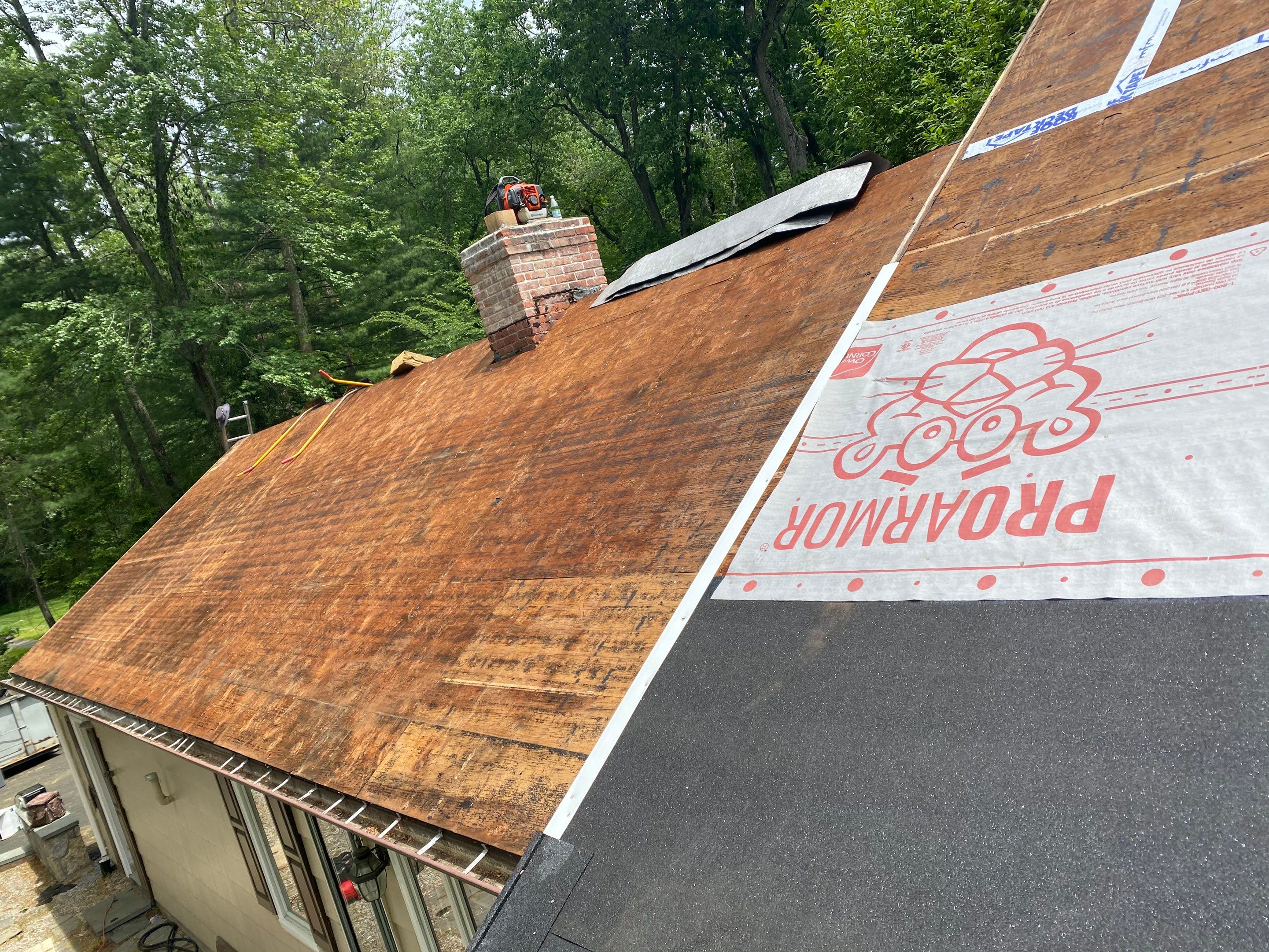 Commercial Roofing Installation using Owens Corning Duration Driftwood by A Plus Exterior