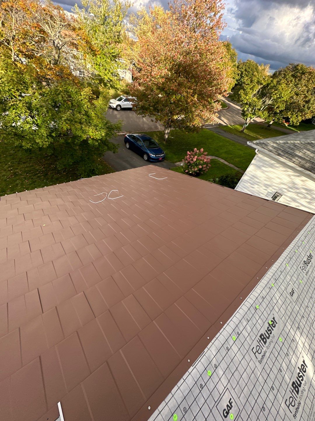 Residential Roofing Installation using Wakefield Bridge Steel Shingle by Ideal Steel by Artisan Roofing & Home Improvements Inc.