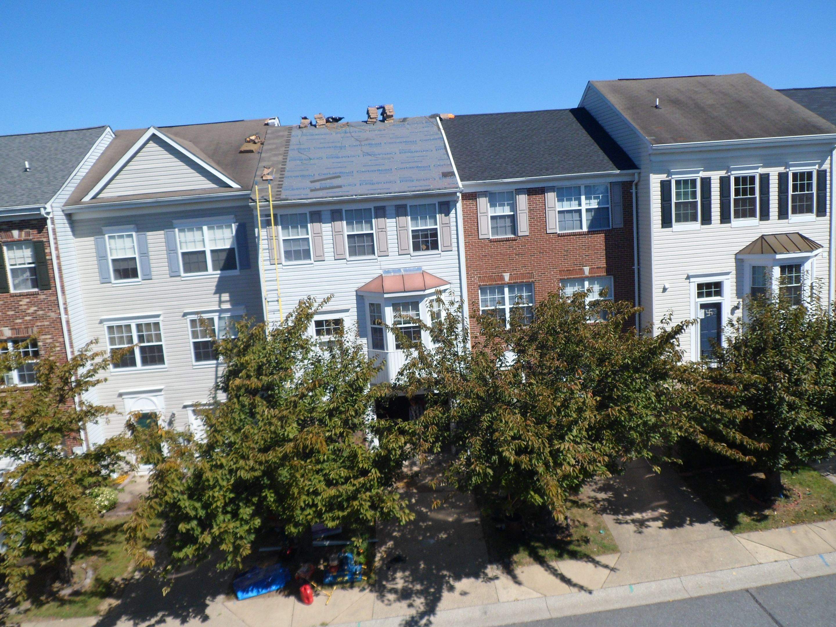 Residential Roofing Installation by Alpha Design Services