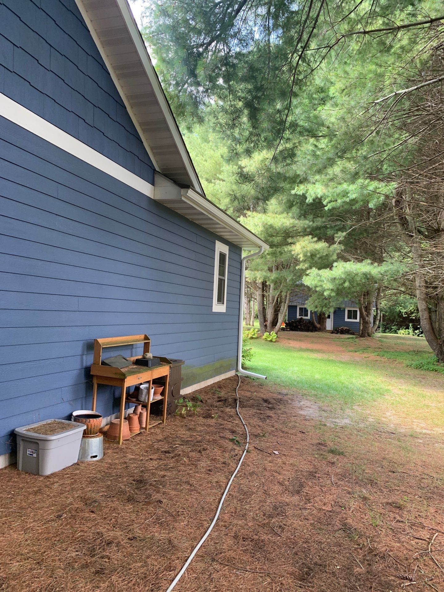 Gutter and Gutter Helmet Installation for Lake Leelanau Home by Rainbow Seamless Systems