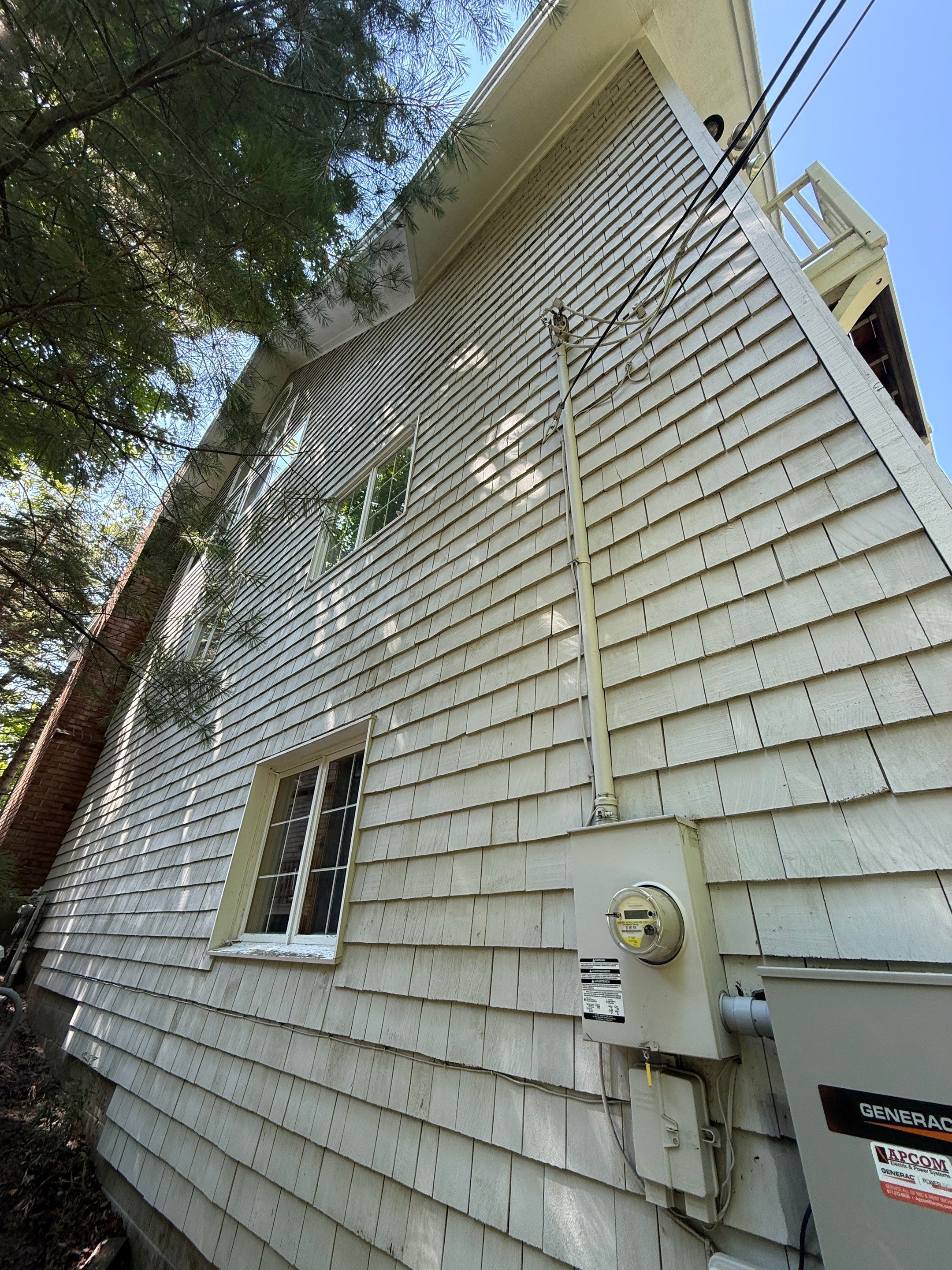 Lakefront Deck Pressure Washing, Exterior Wood Staining, and Painting in West Olive MI by Gordon Painting