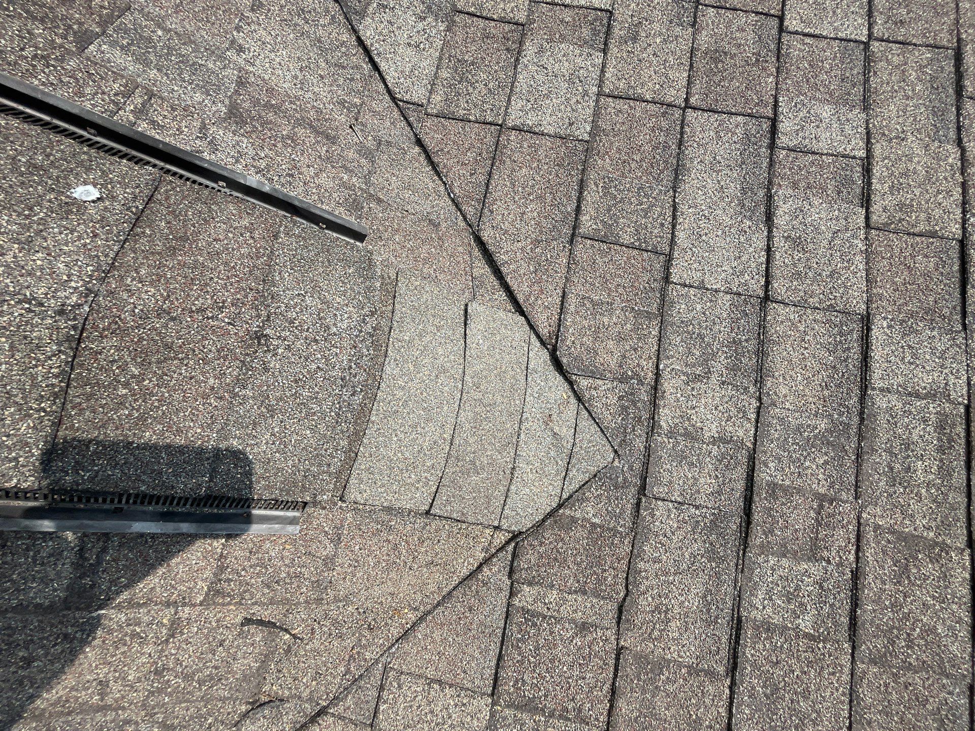 Hail Damage using Owen's Corning Duration (Lifetime) Shingles by Roof Repair Company