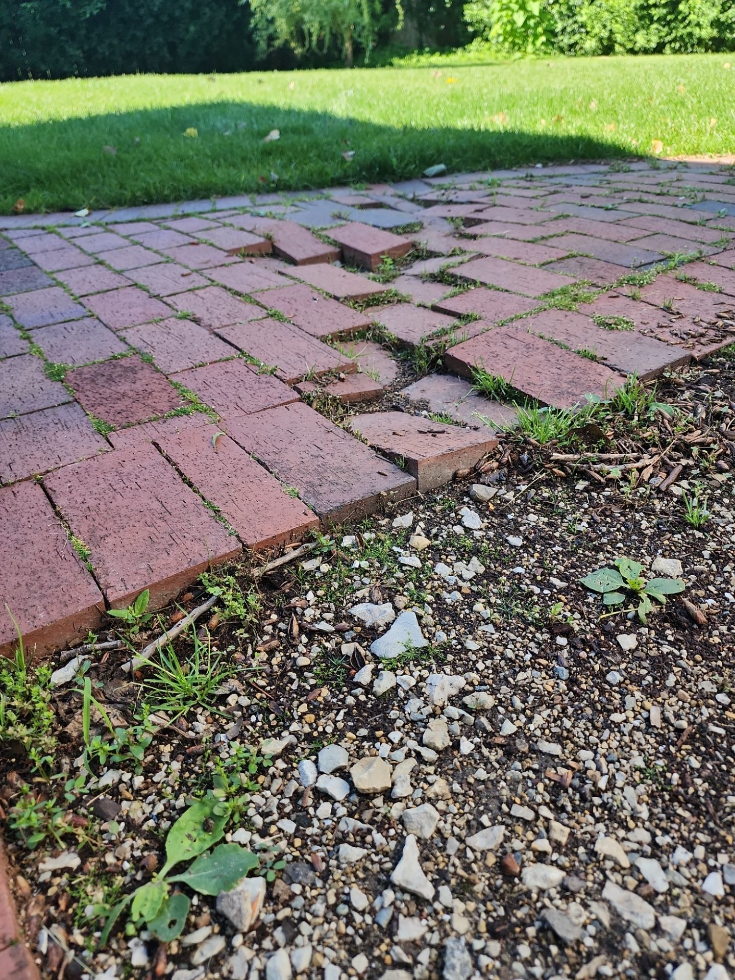 Brick paver repair, cleaning and sealing by Northern Power Washing LLC.