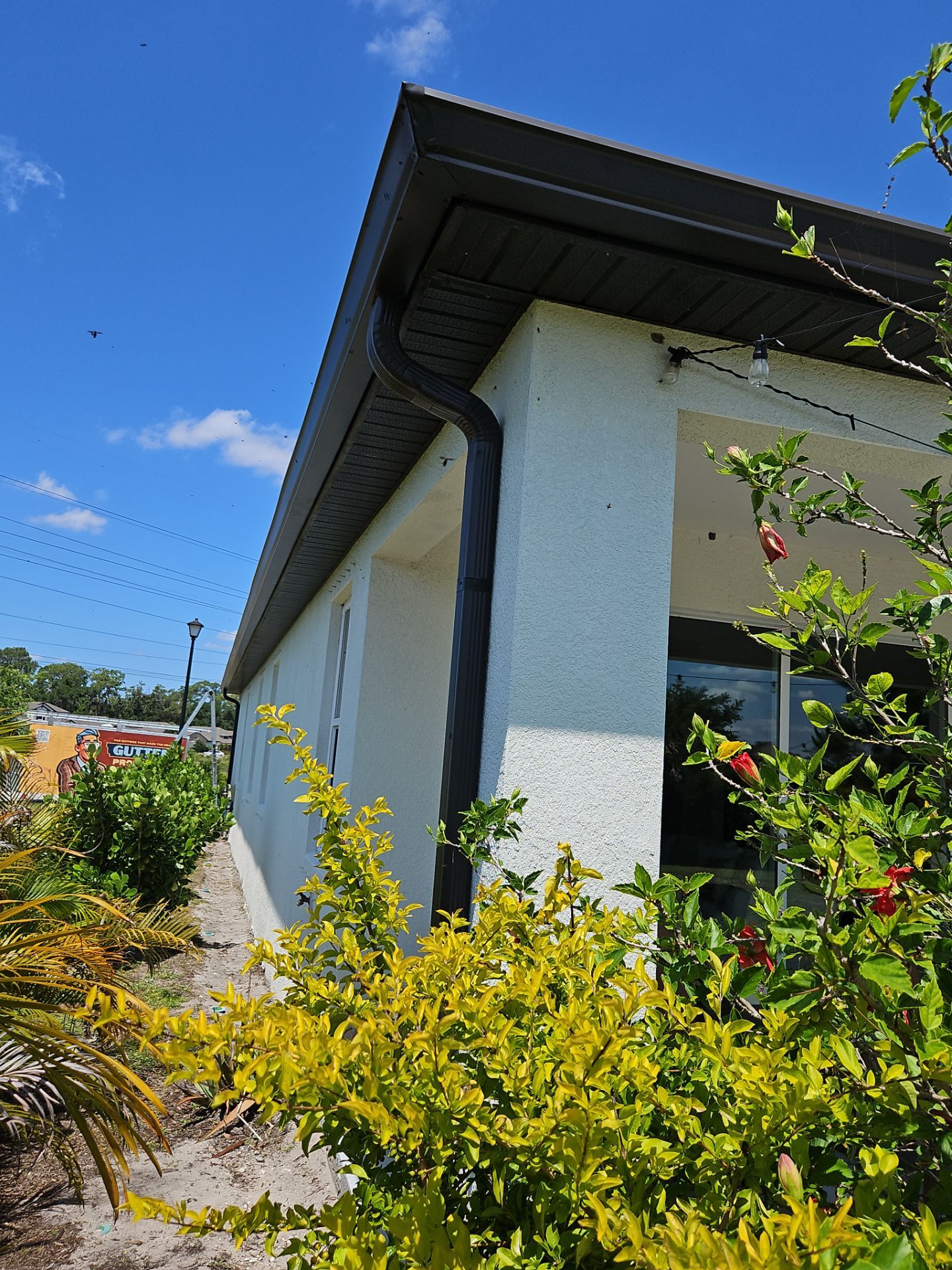 K-Style Seamless Gutter Installation using bronze gutters in Sarasota FL by Gutter Professors