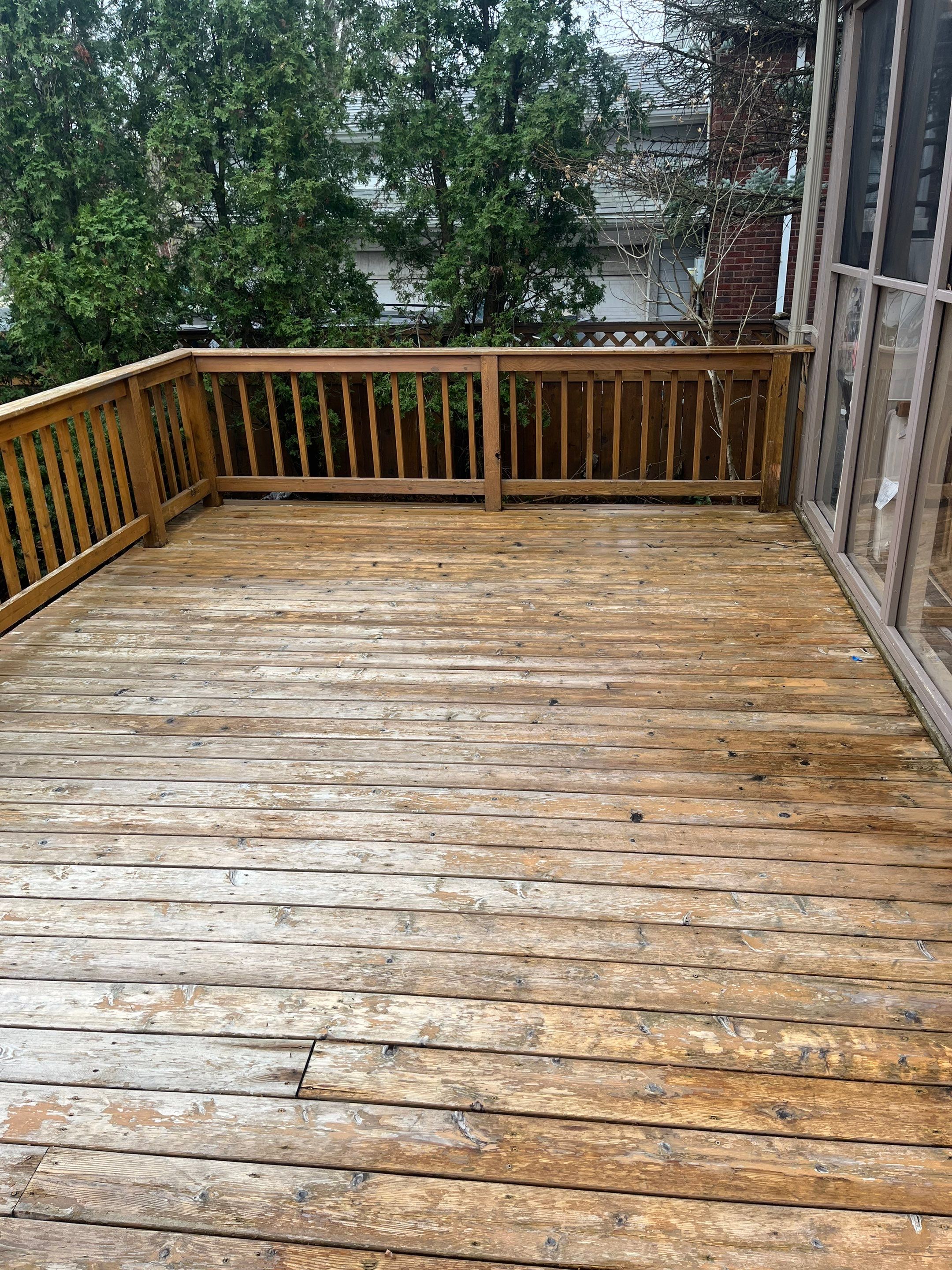 Wood cleaning and staining using Armstrong cloark oil stain by Northern Power Washing LLC.