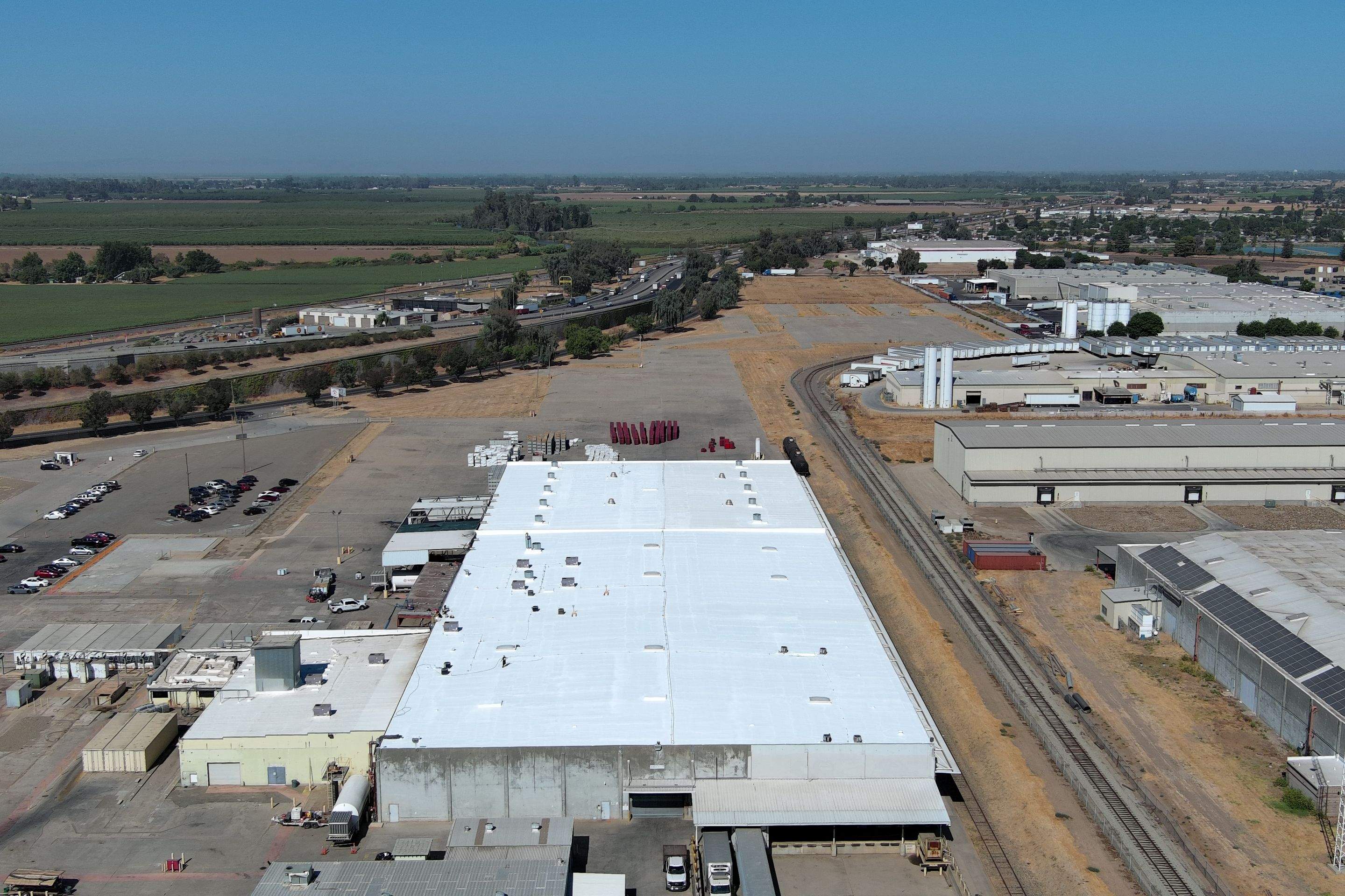 Pro Farms Spray foam roofing project by Straight Edge Roofing Inc