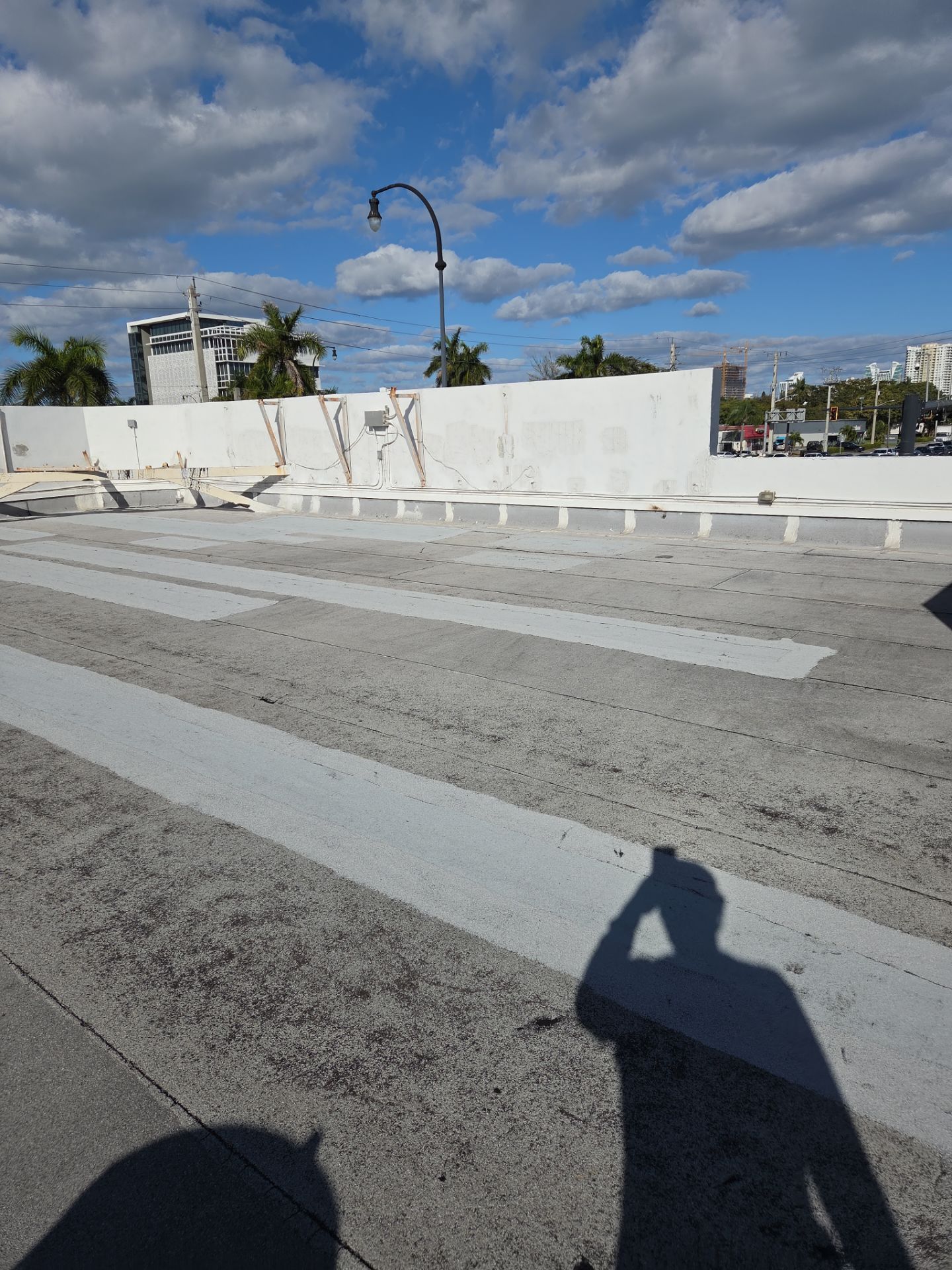 Commercial Flat Roof Restoration Using Silicone Coating in Hallandale Beach by Aastro Roofing