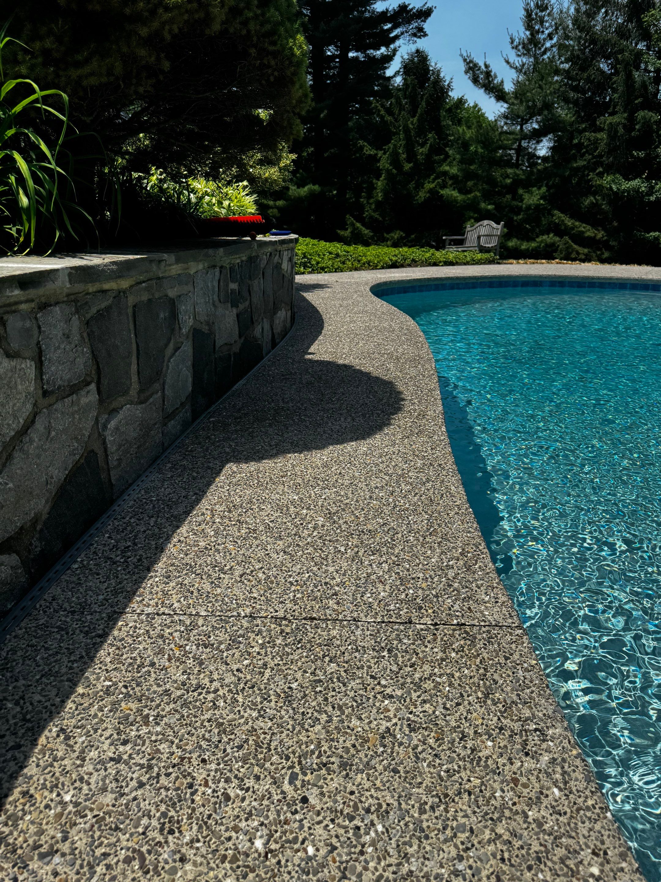 Exposed Aggregate Pool Deck Renovation in Villanova by Architectural Concrete Design
