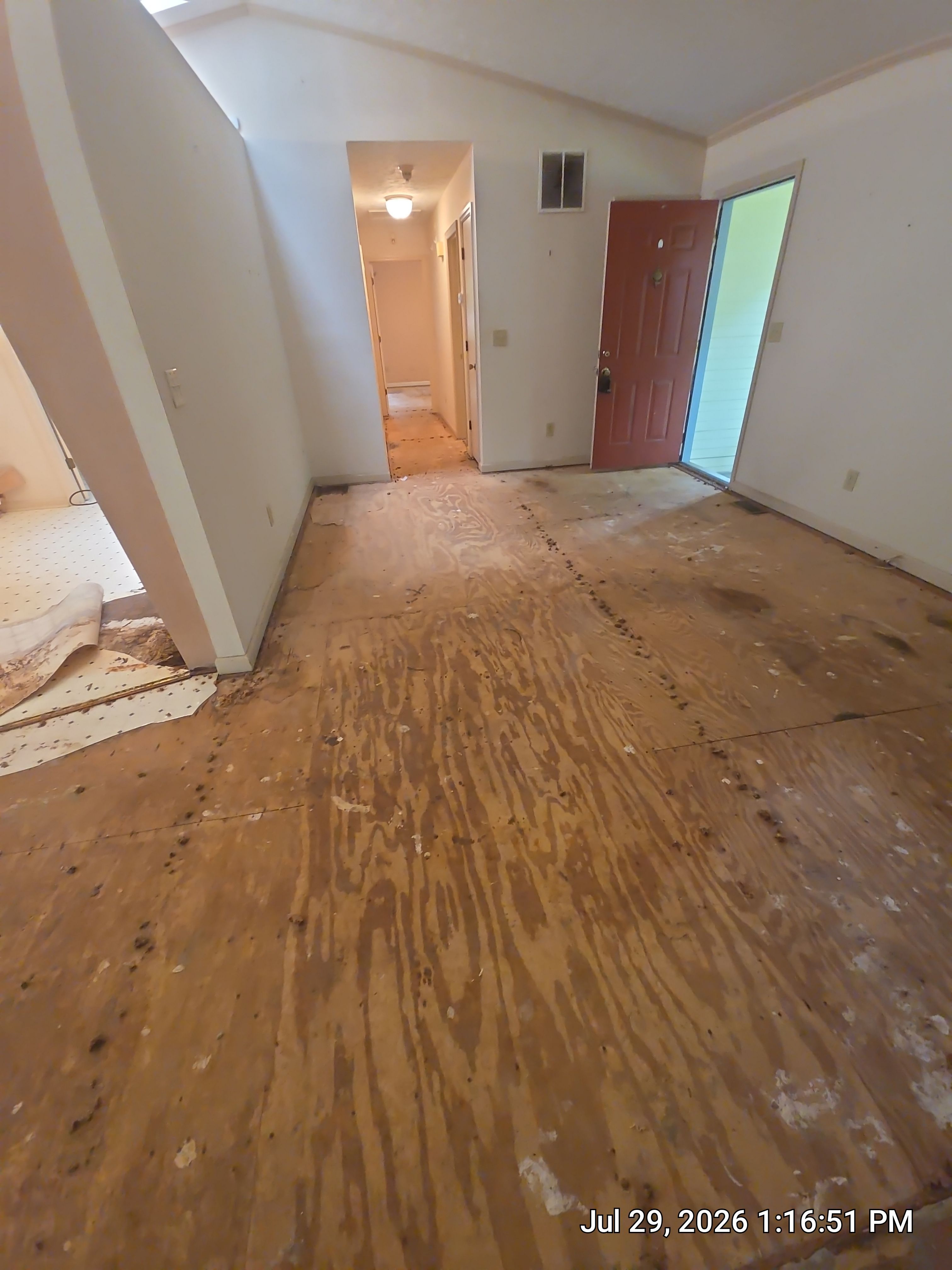 Full Home Subfloor Restoration and Luxury Vinyl Flooring Installation by Flooring Xpress CO