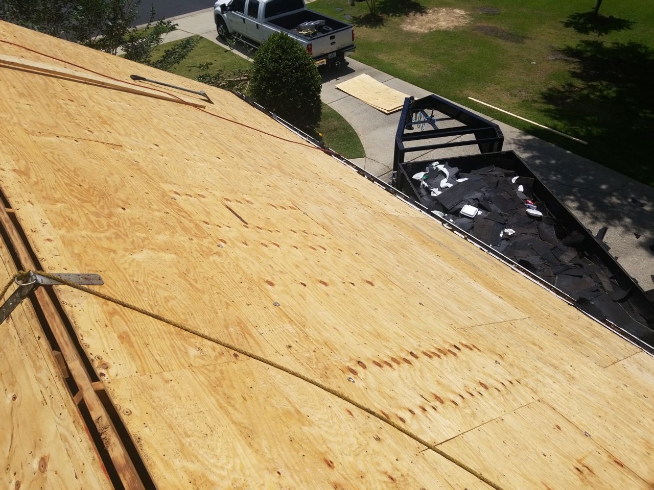 Residential Roofing Installation using Roof Replacement by American Roofing & Construction LLC