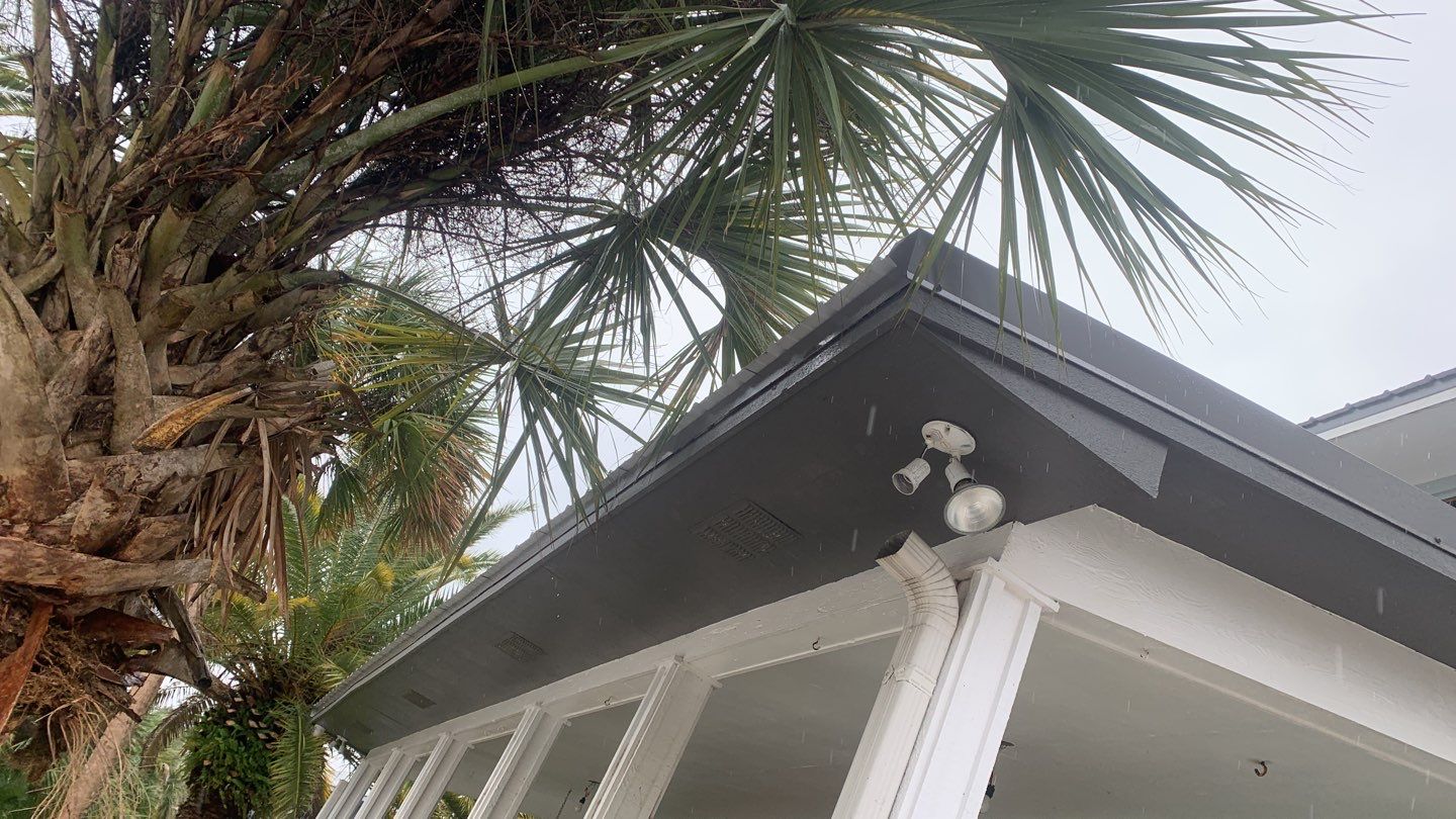 Seamless Gutter Installation using Charcoal Grey Gutters by Gutter Professors