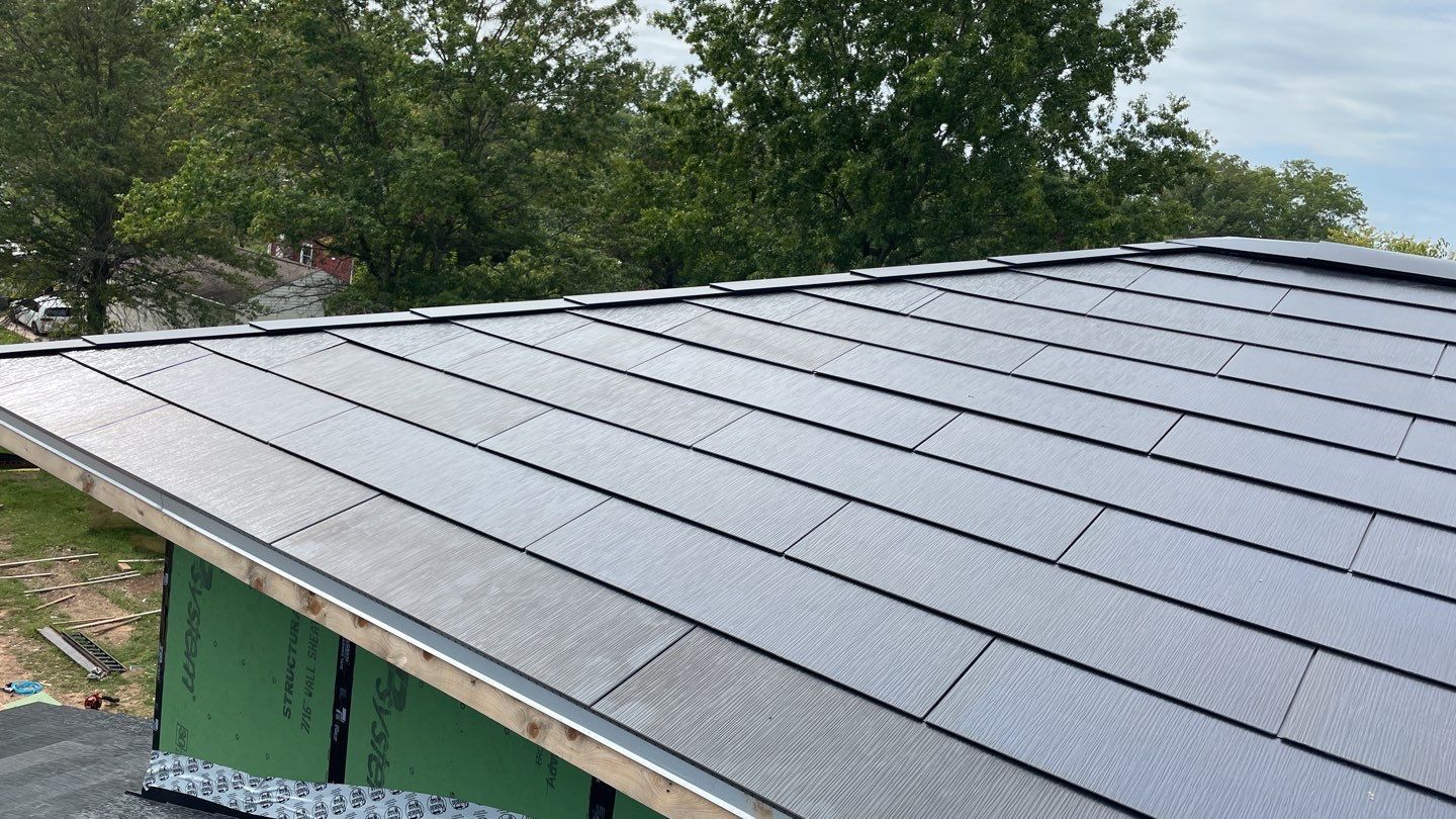 Tesla Solar Roof  using Tesla Solar Roof V3 tiles by American Home Contractors