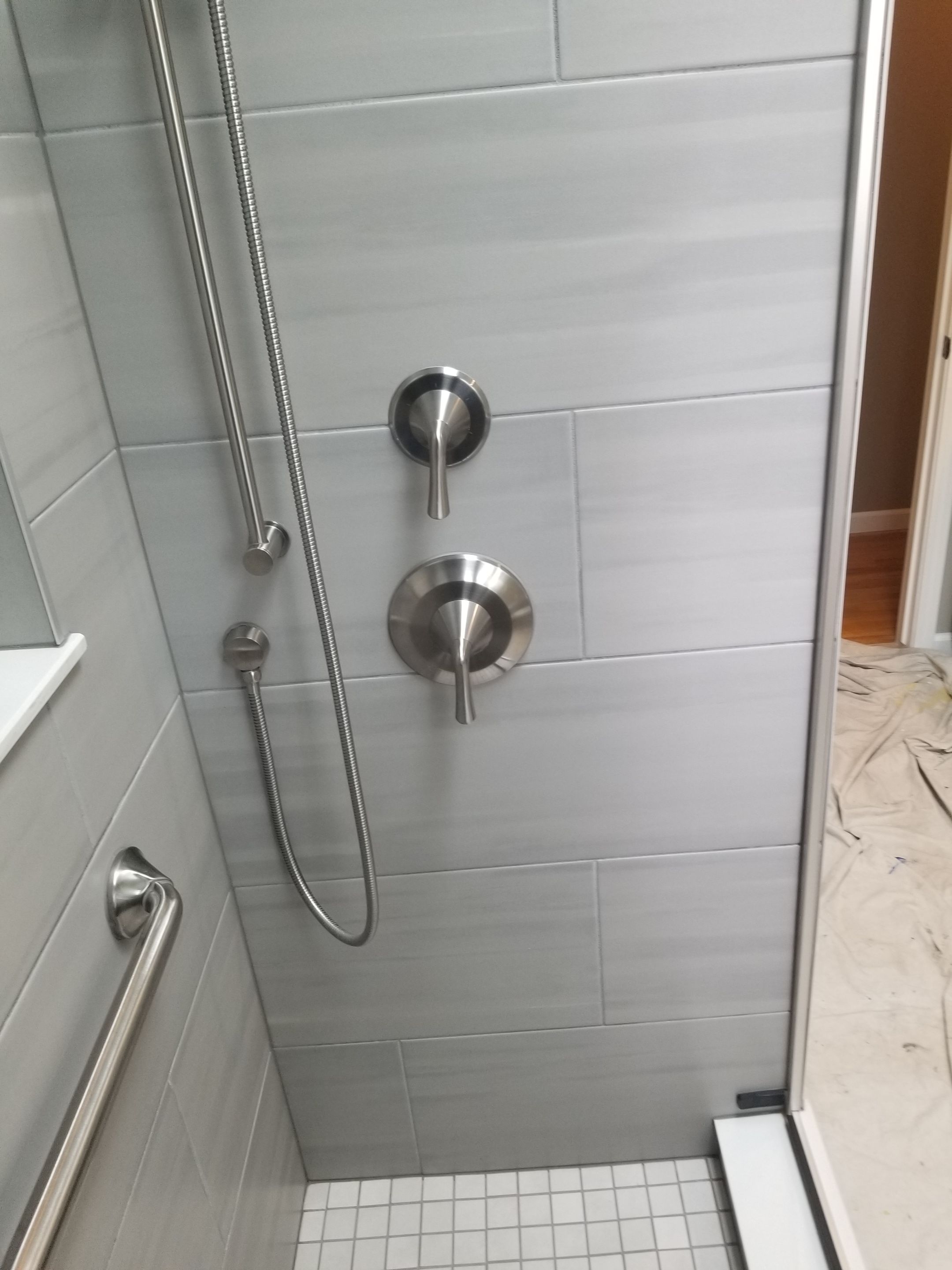Remodel full bathroom new tile walk in shower plus 2nd half bath Powder room in Livonia, MI by Northwest Construction