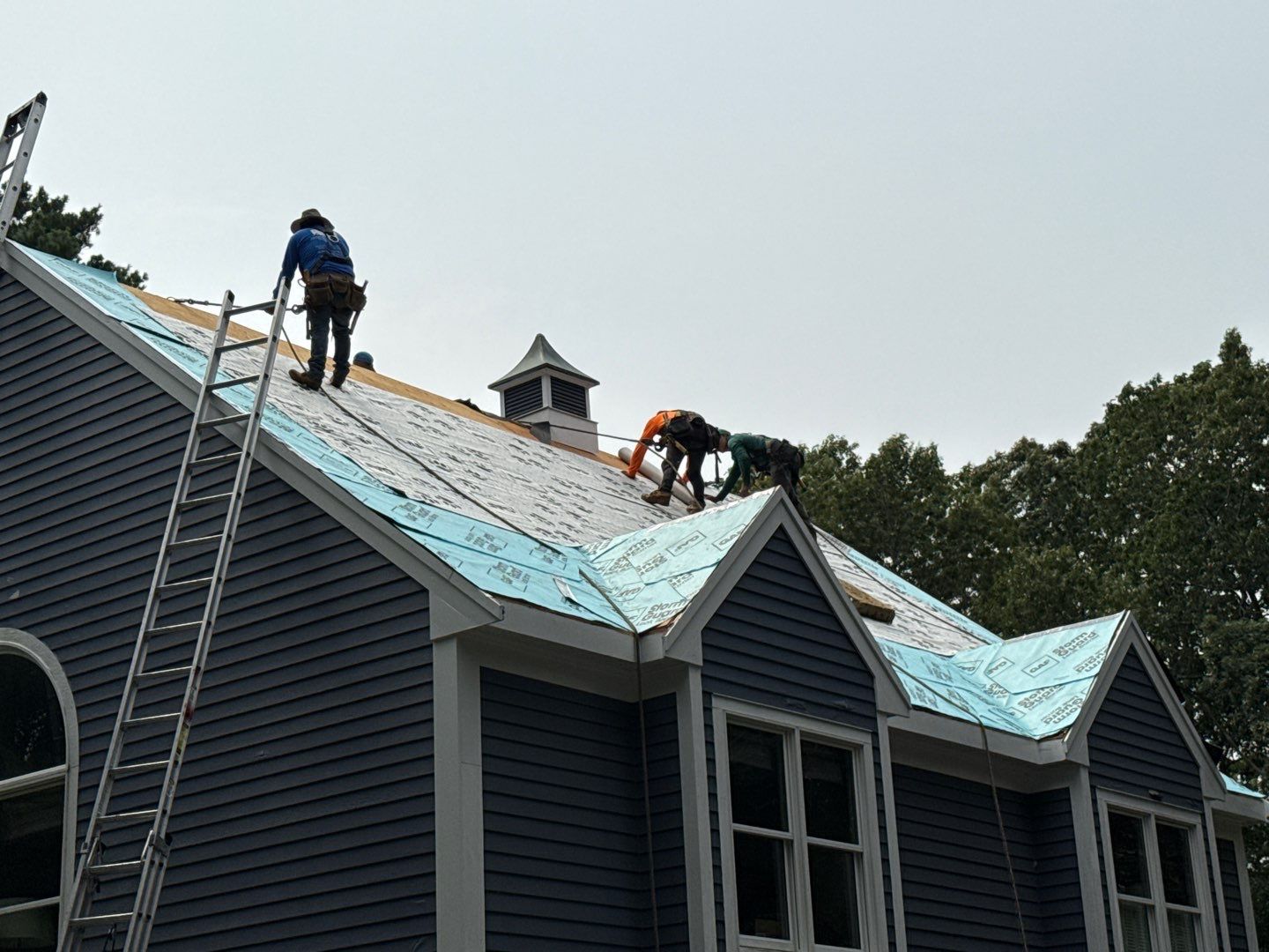 Solar-Ready Roof Replacement with GAF Pewter Gray Shingles & VELUX Skylights by Sensible Home Solutions