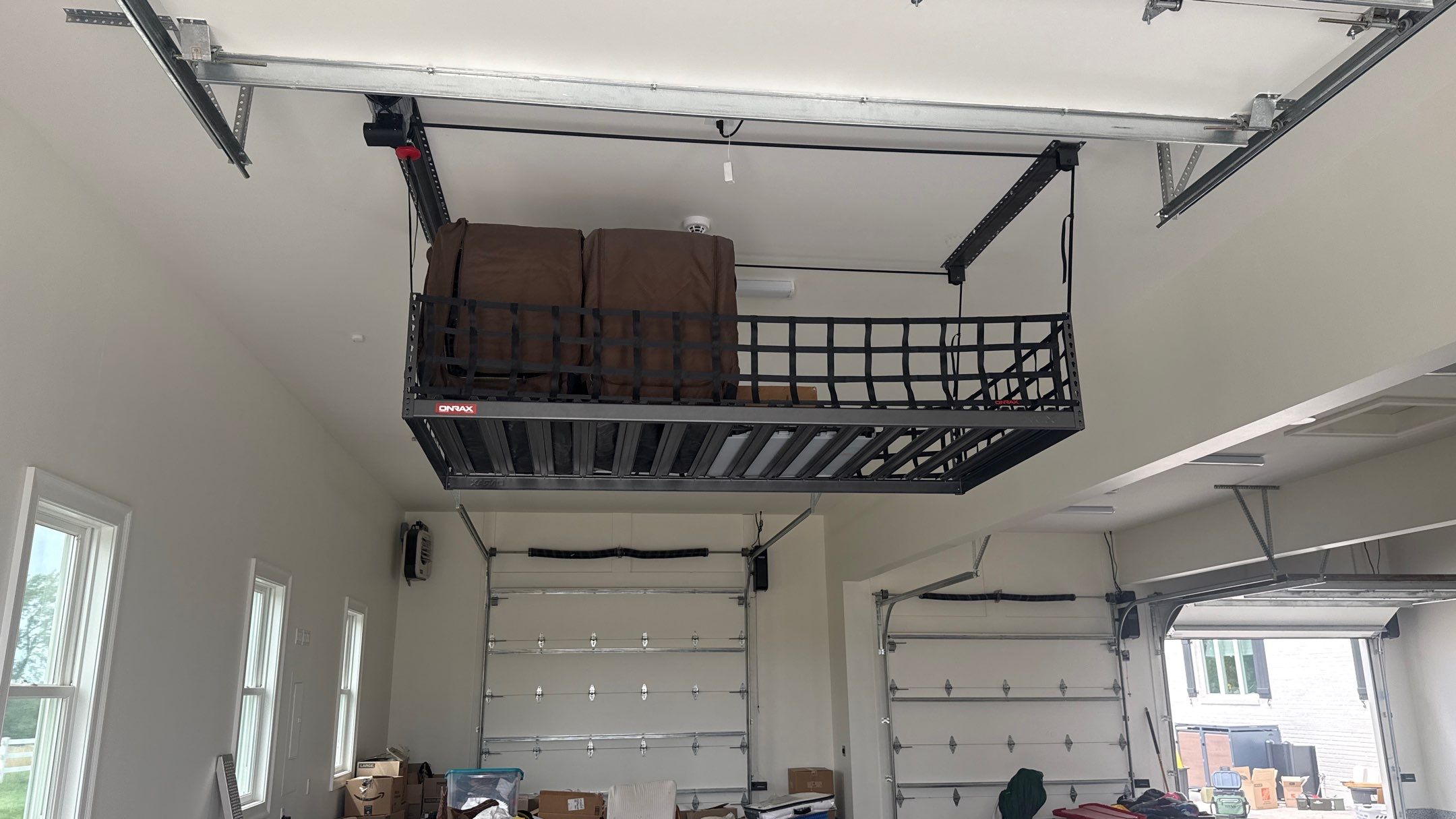 Mark Added Storage Plus A Motorized Lift  by Banner Garage