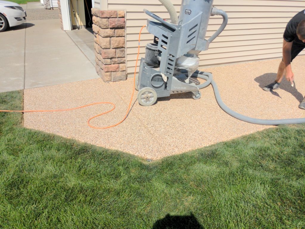 Patio Transformation using Sandstone by Croc Coatings, LLC