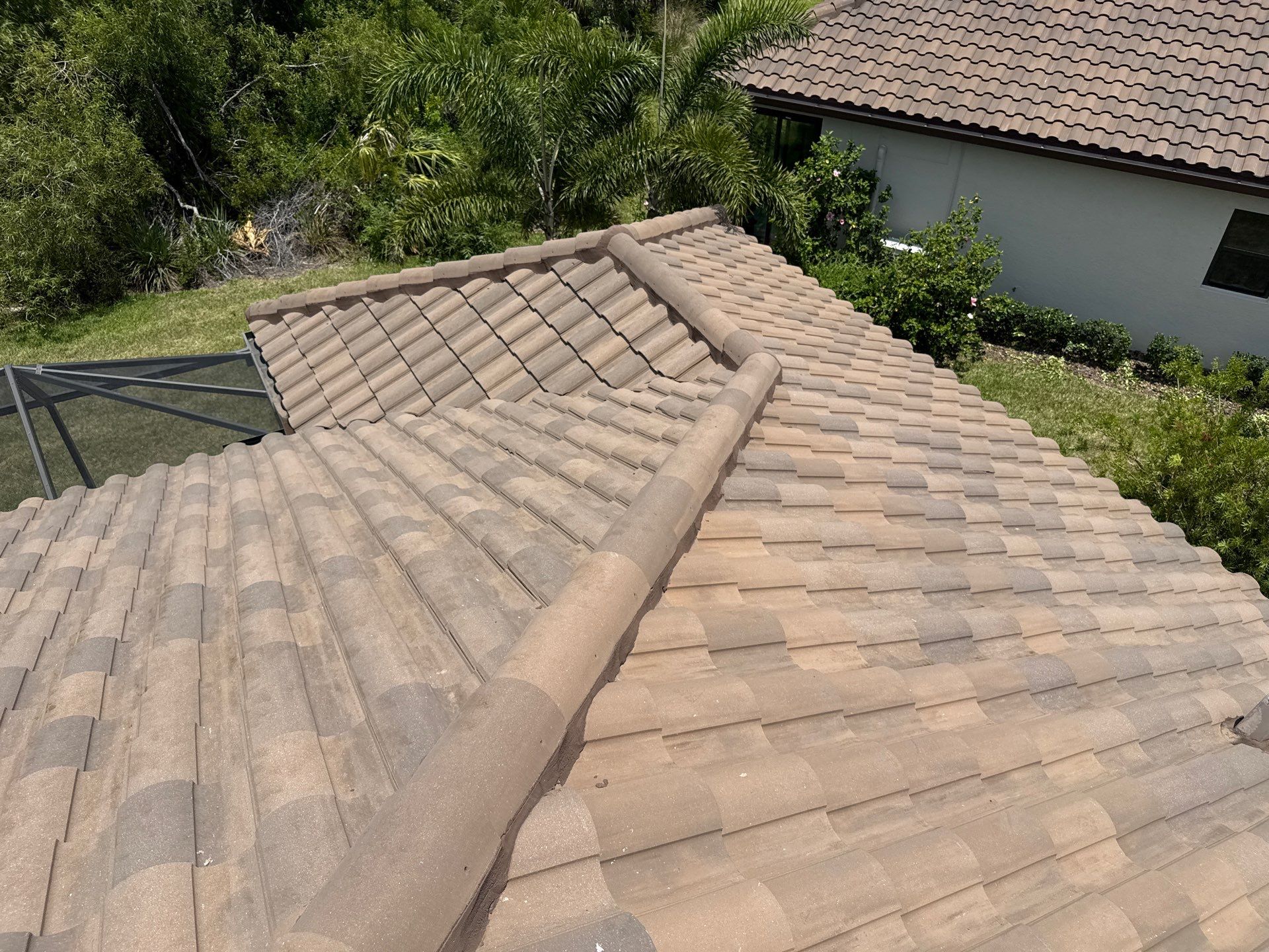 Concrete Tile Roof, Paver Driveway & Lanai Cleaning – Artisan Lakes Esplanade, Palmetto, FL by Sunshine AquaWash