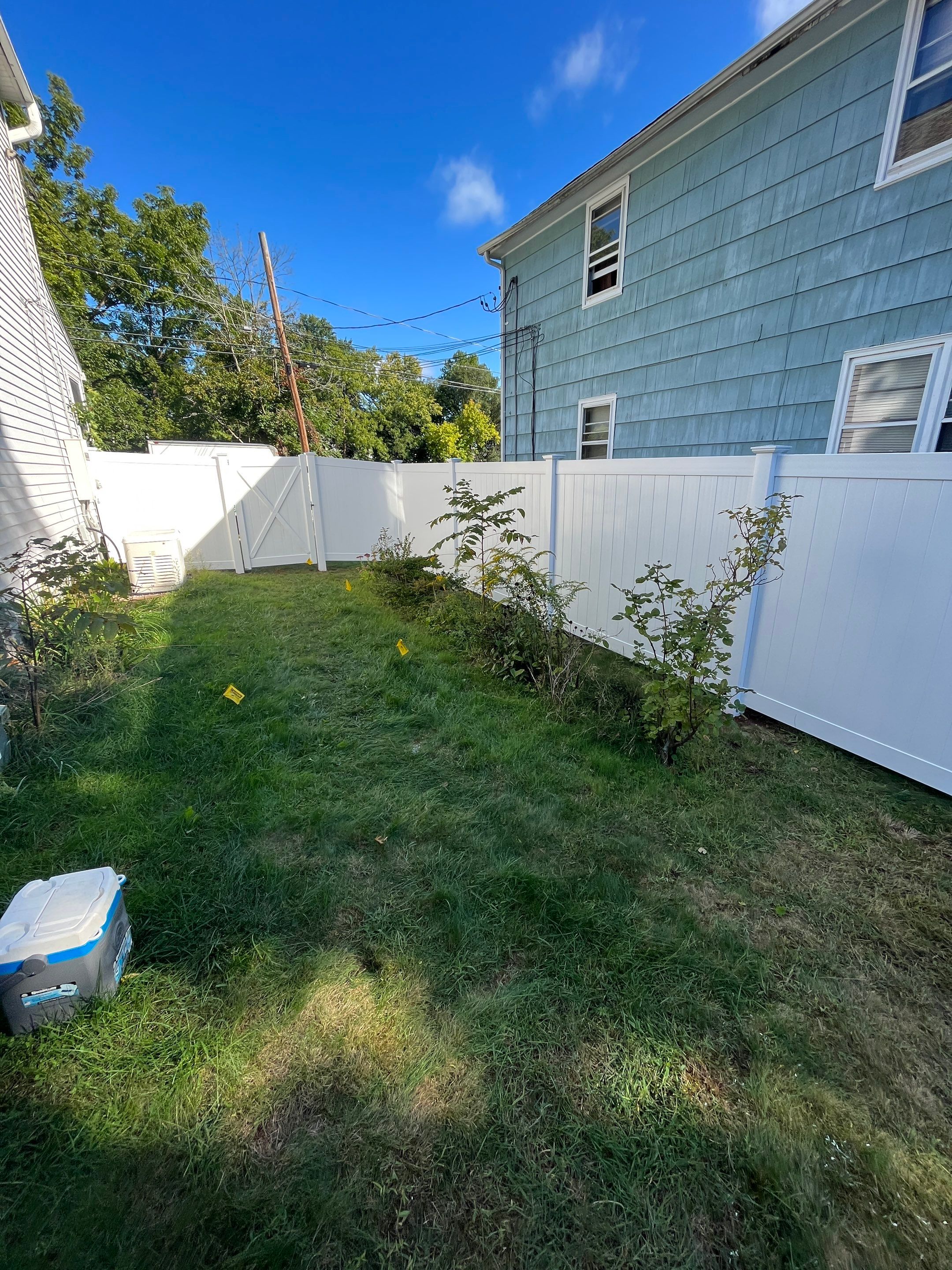 Vinyl Privacy fence with matching gate, White by DiGiorgi Roofing and Siding Inc