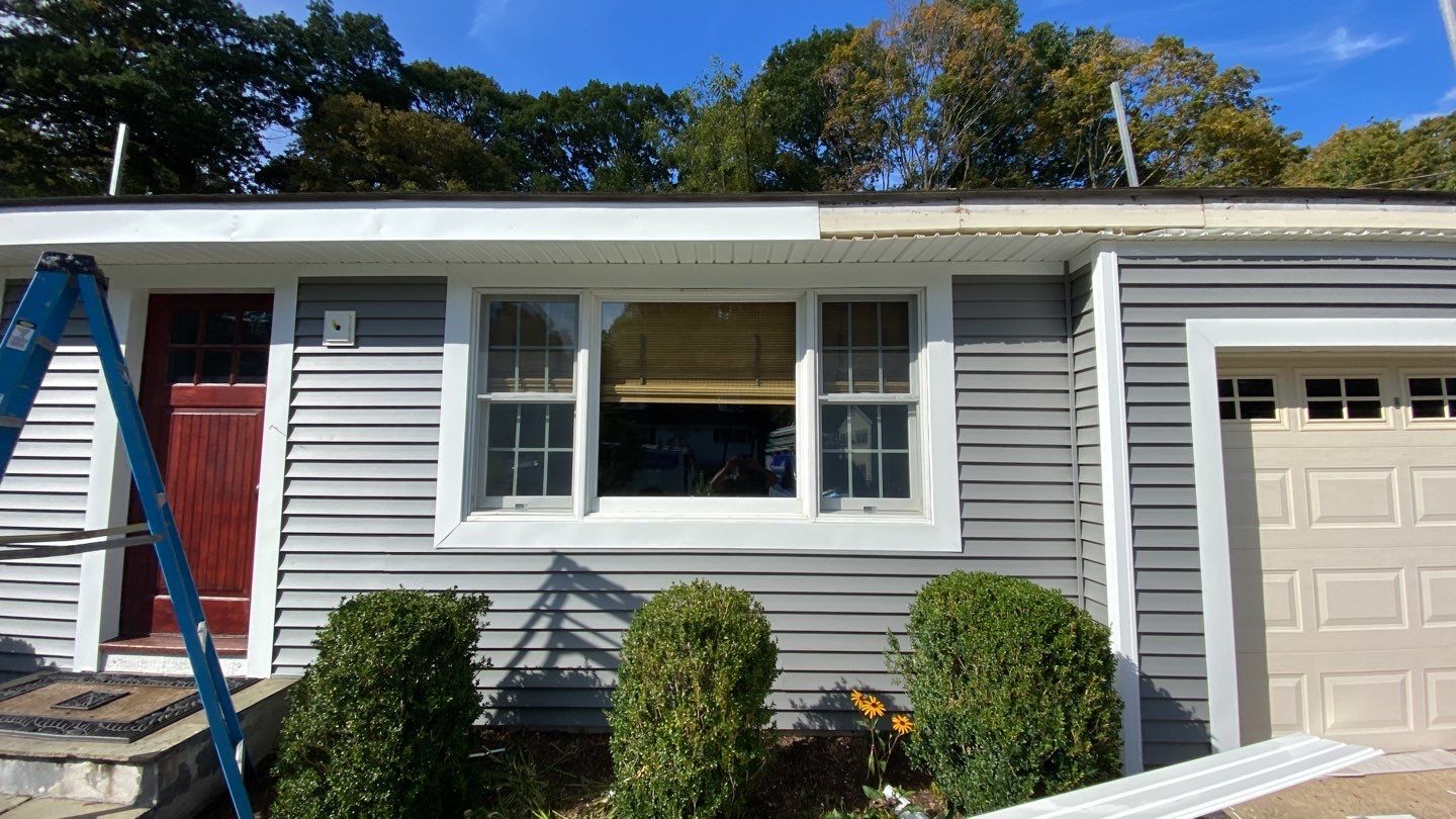 Siding Installation using CertainTeed monogram 4" double 4 Charcoal Gray by A Plus Exterior