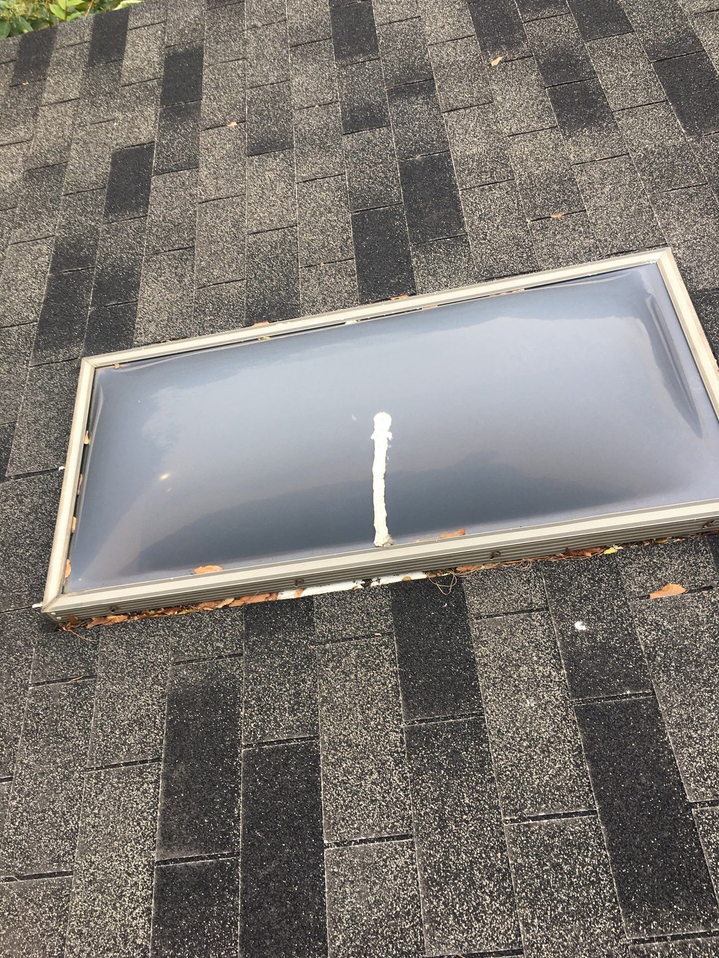 Roof and Skylight Replacement by American Home Contractors