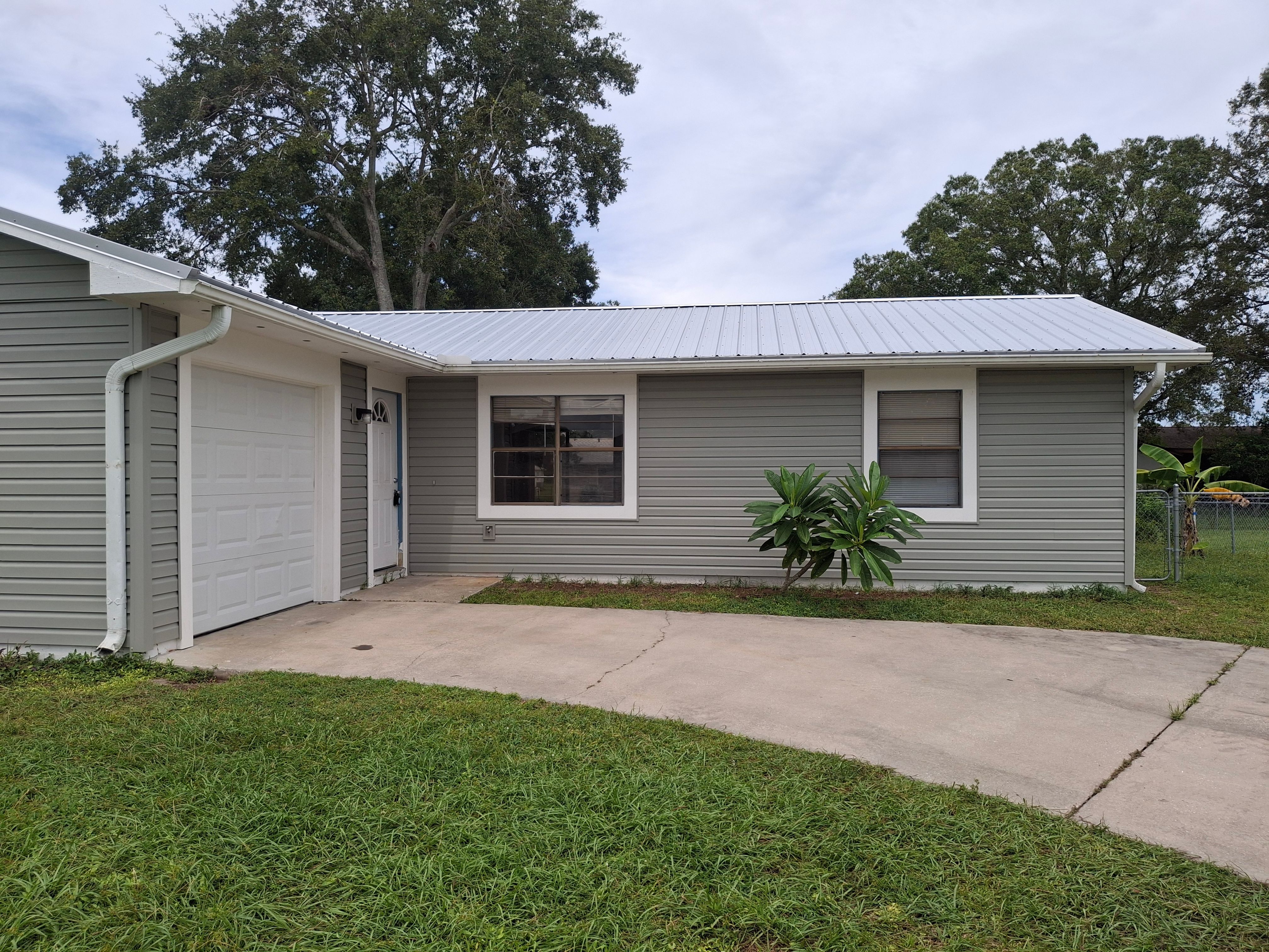 Vinyl Siding Installation and Structural Wood Rot Repair in Palm Bay by Florida Roofing and Renovations Inc.