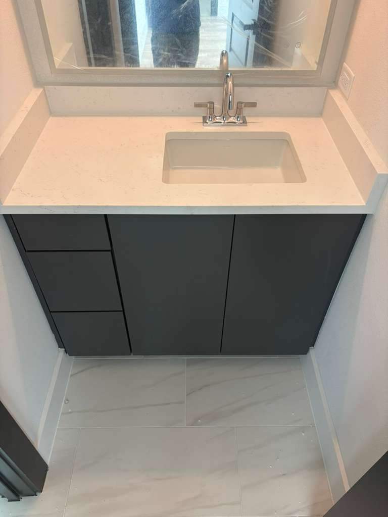A home with a mix of quartz options by Mena stone surfaces