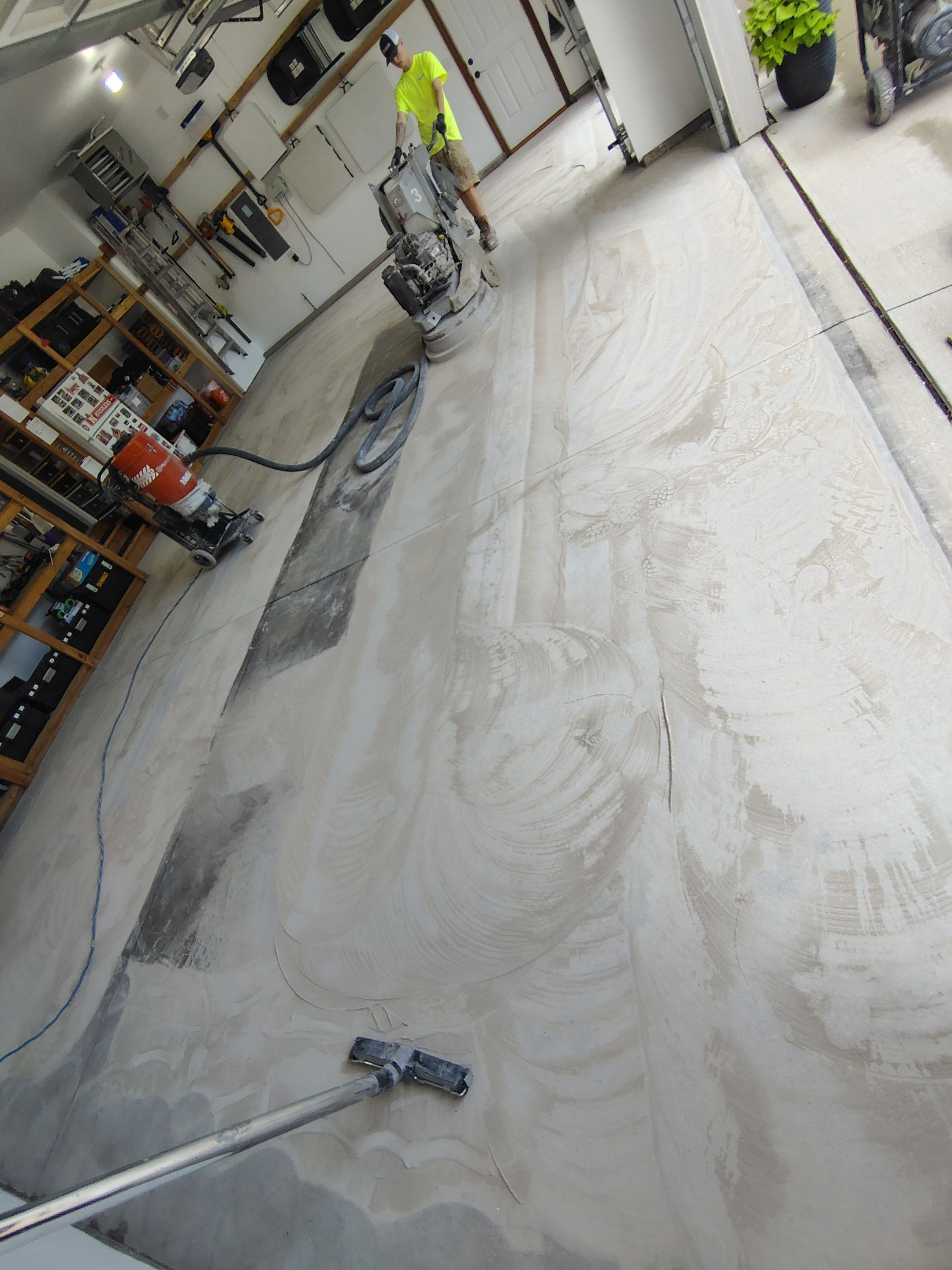 Coyote Garage Floor Coating in Sioux Falls by Select Painting, Coatings & Garage Cabinets
