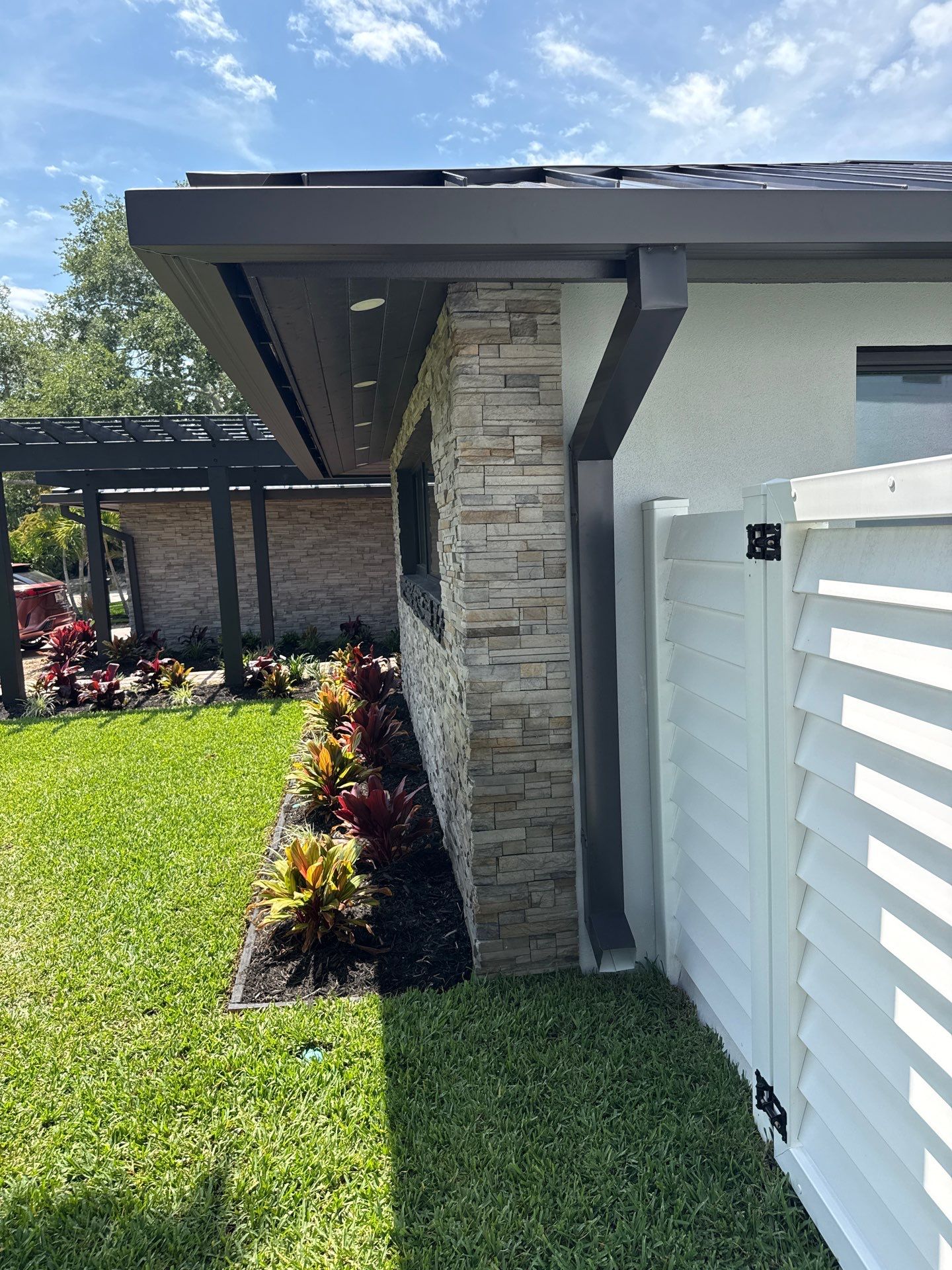 7-Inch Smooth Box Seamless Gutters using black seamless gutters in Siesta Key Fl by Gutter Professors