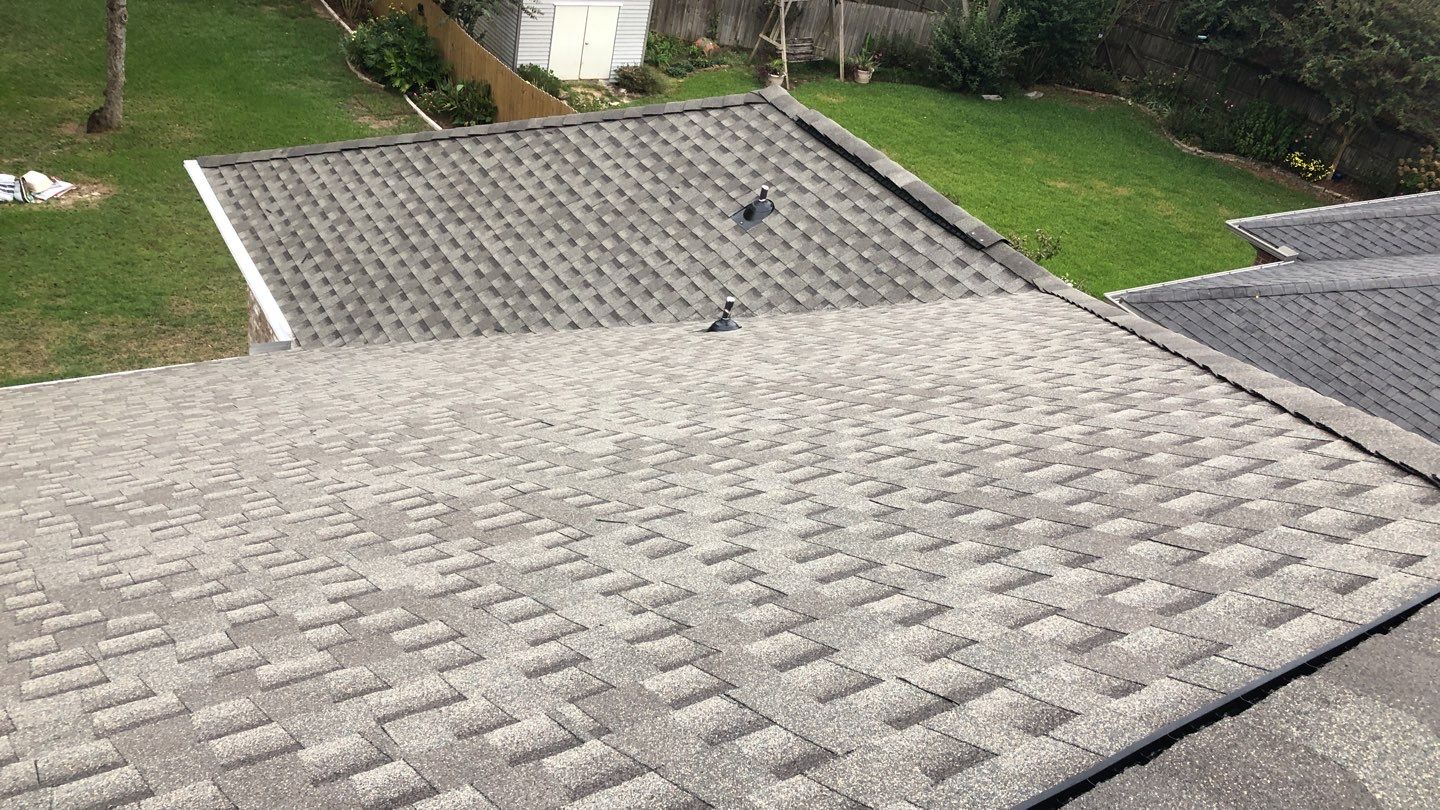 Residential Roofing Installation using Roof Replacement by American Roofing & Construction LLC