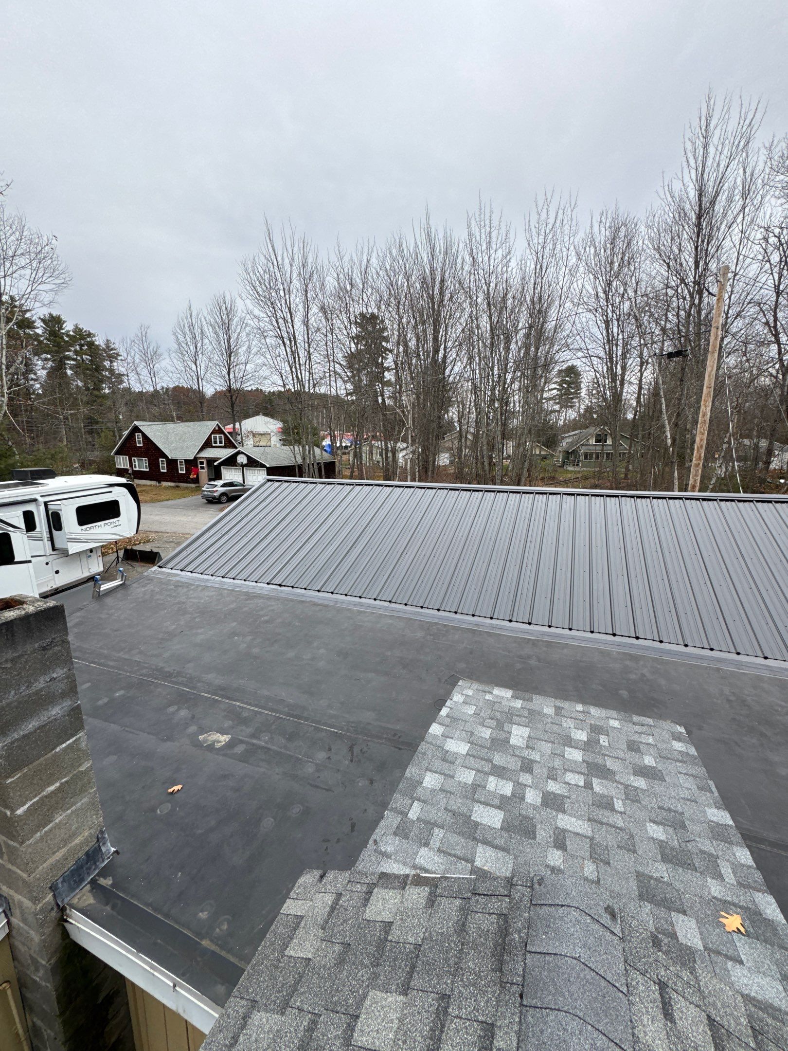 Gilford, NH Metal Roof Installation on Lake Winnipesaukee – Screw-Down Metal Roofing System by Compass exteriors