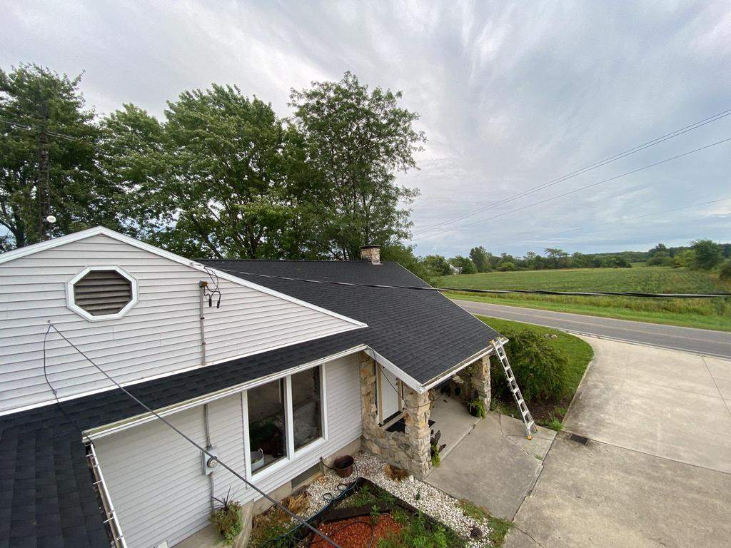 Storm damage roof replacement by Nitro Roofing and Construction