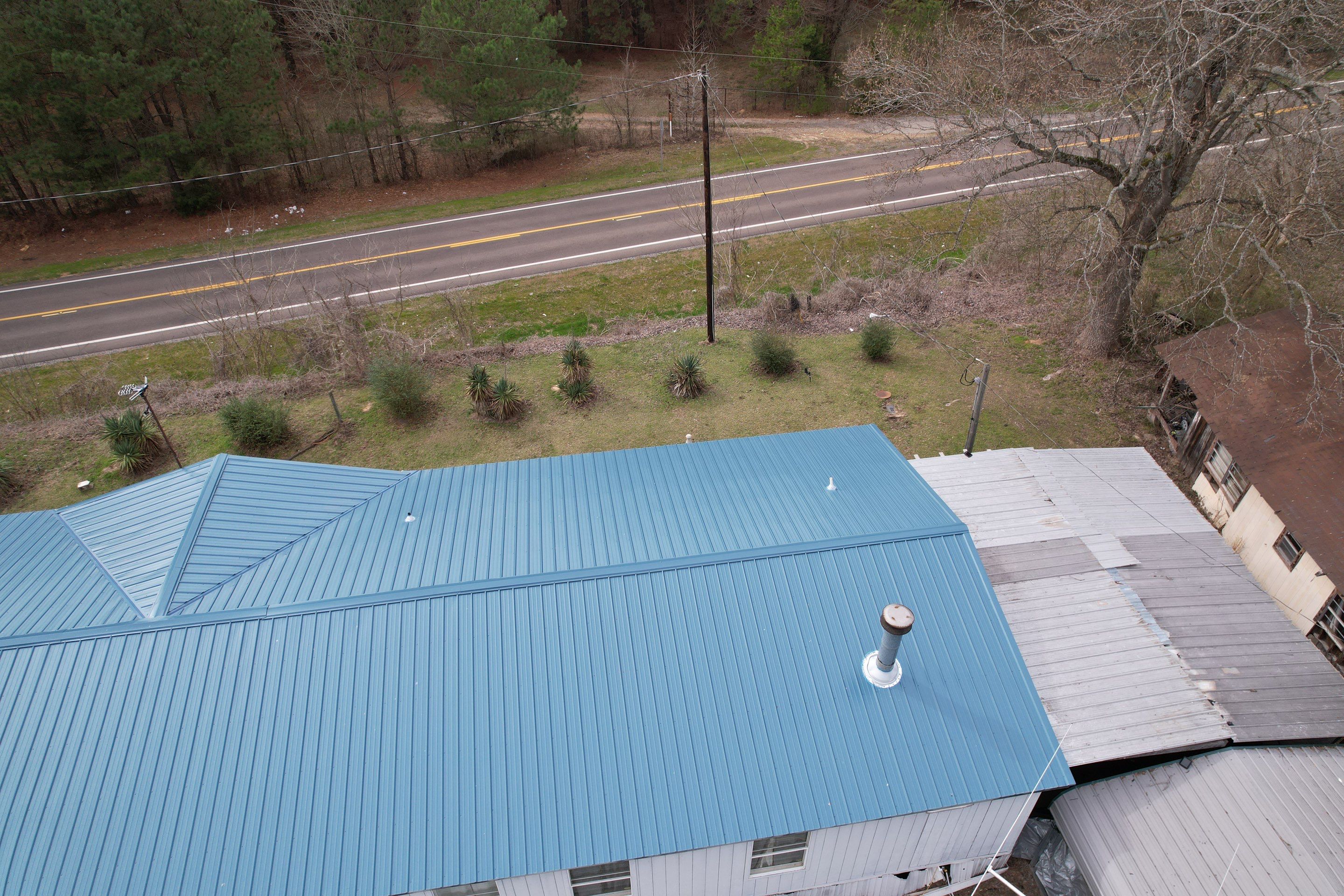 Residential Roofing Installation using 29 gauge metal by Hostetler Roofing
