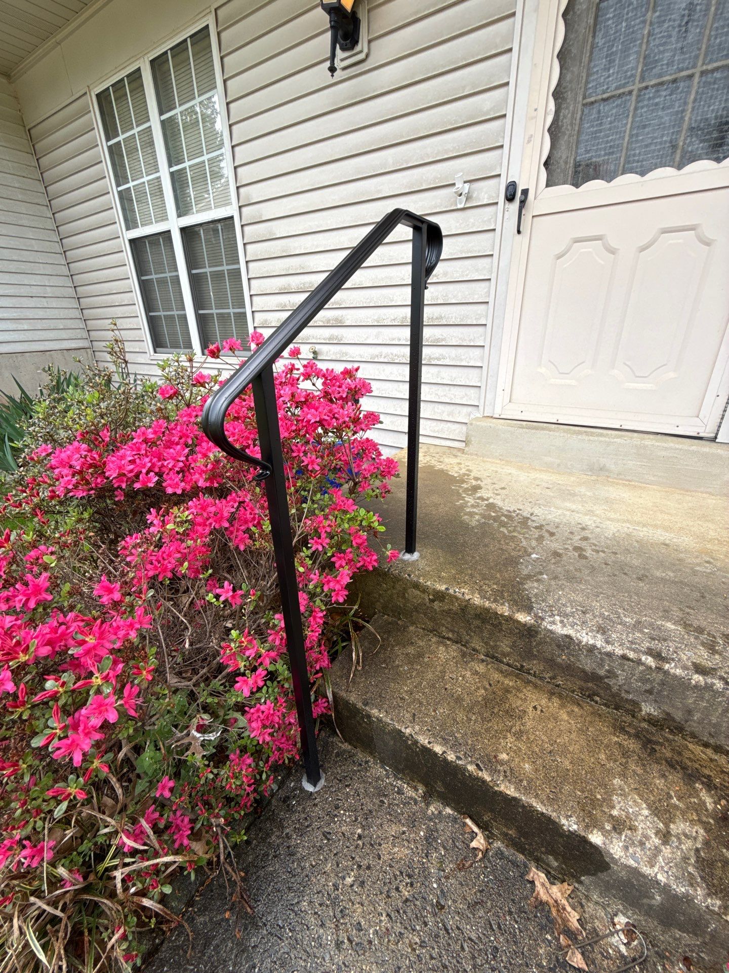 Custom Black Metal Exterior Handrail Installation in Olney by Capitol Iron Works