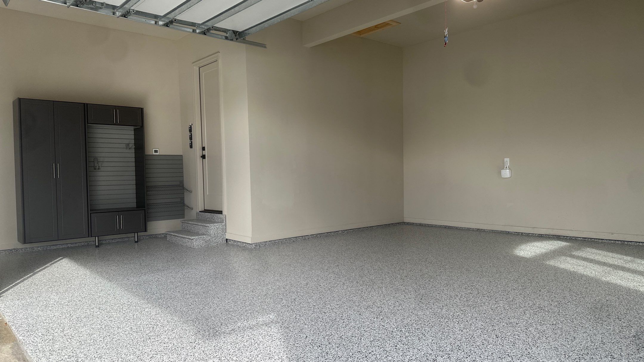 Tim S. added Cabinets and a Banner Garage Floor to his garage by Banner Garage