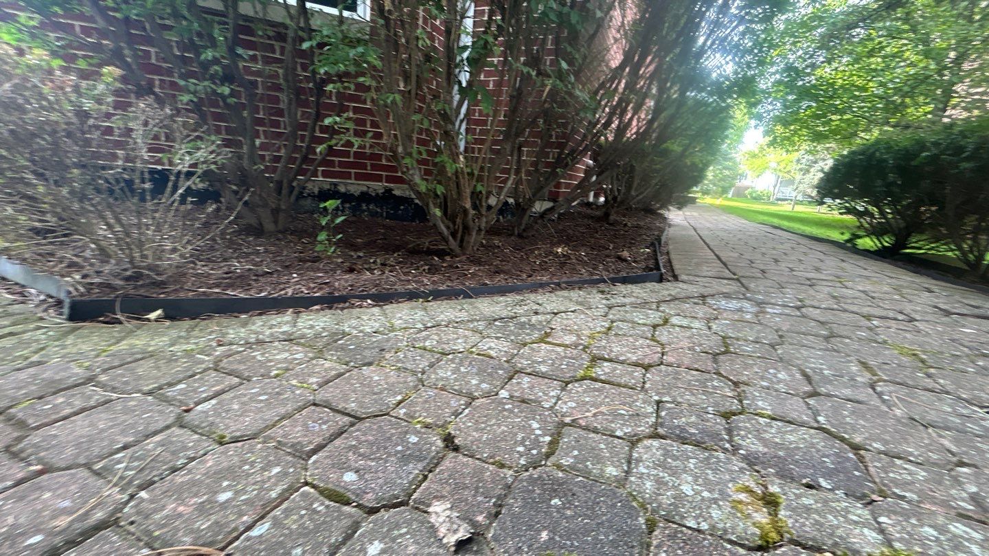 Brick paver repair, clean and seal by Northern Power Washing LLC.