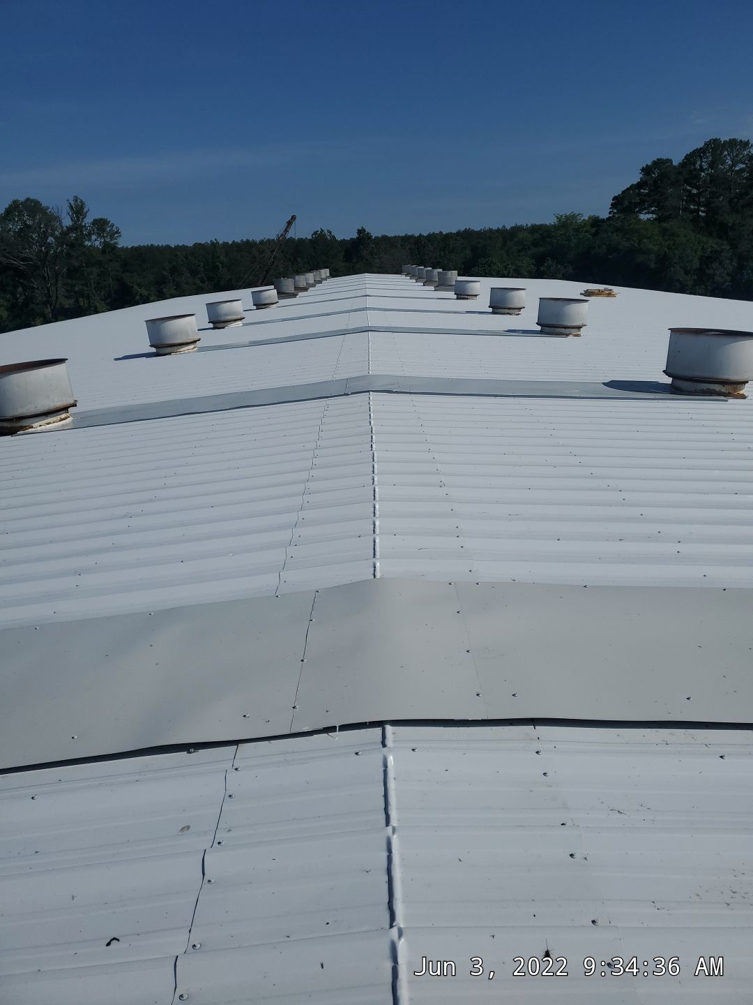 Commercial Roofing Installation using Aluminum Roofing panels by Hostetler Roofing