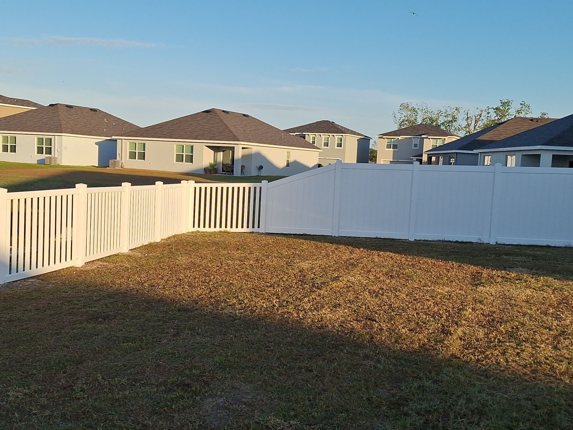 Vinyl Fence Installation using 6Ft White Vinyl Privacy Fence with a 4Ft White Clearwater Picket Fence by Asap fence and gates, LLC