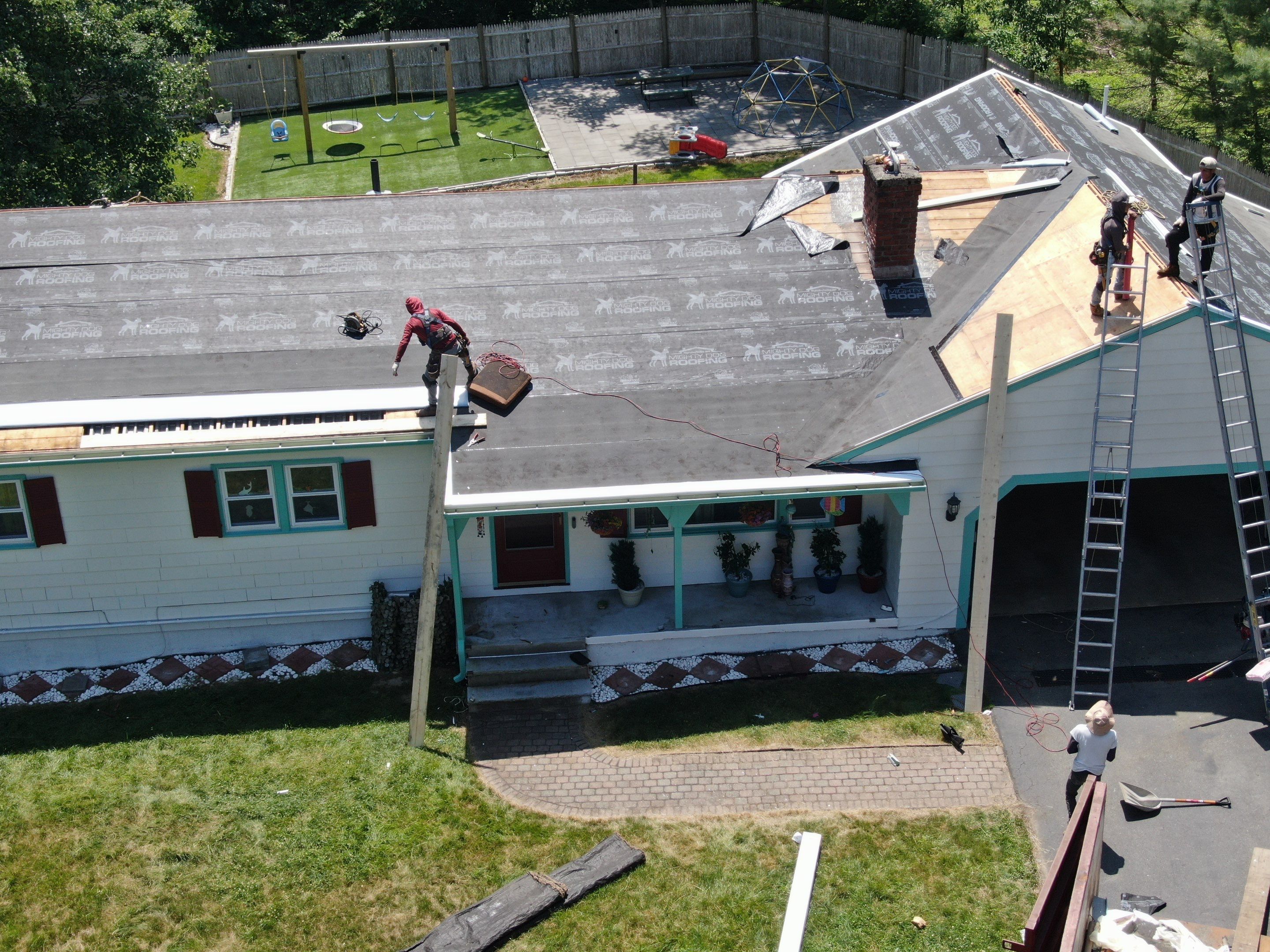 Roof Replacement with Gutter Guards – Westford, MA by Mighty Dog Roofing of Greater Middlesex County