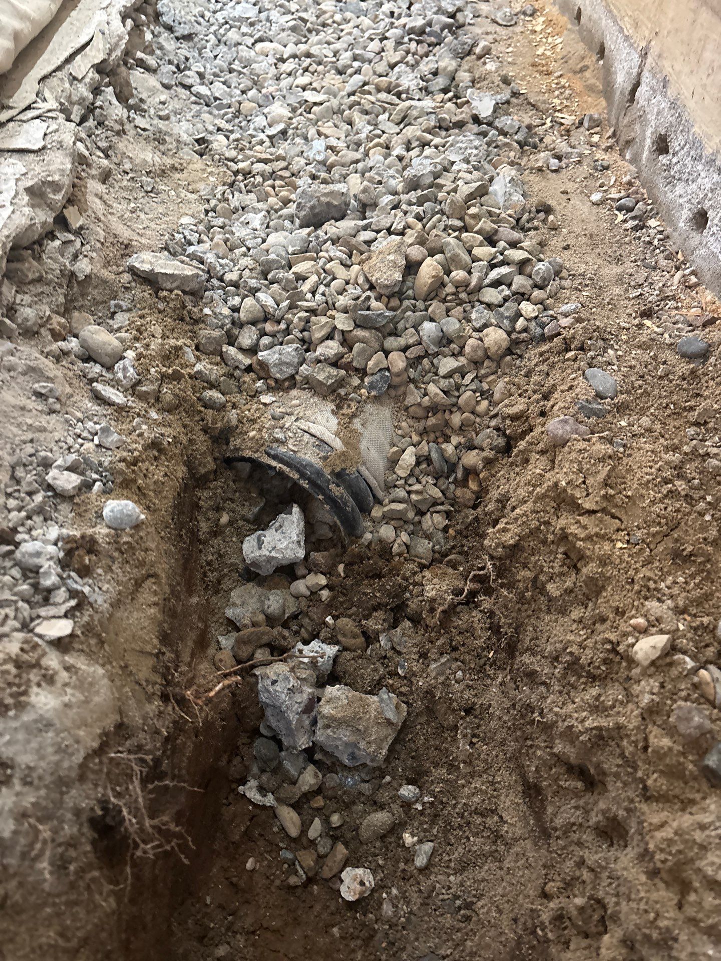 Completing the Connection for Lisa's Drain Tile System by Waterproofing Northeast