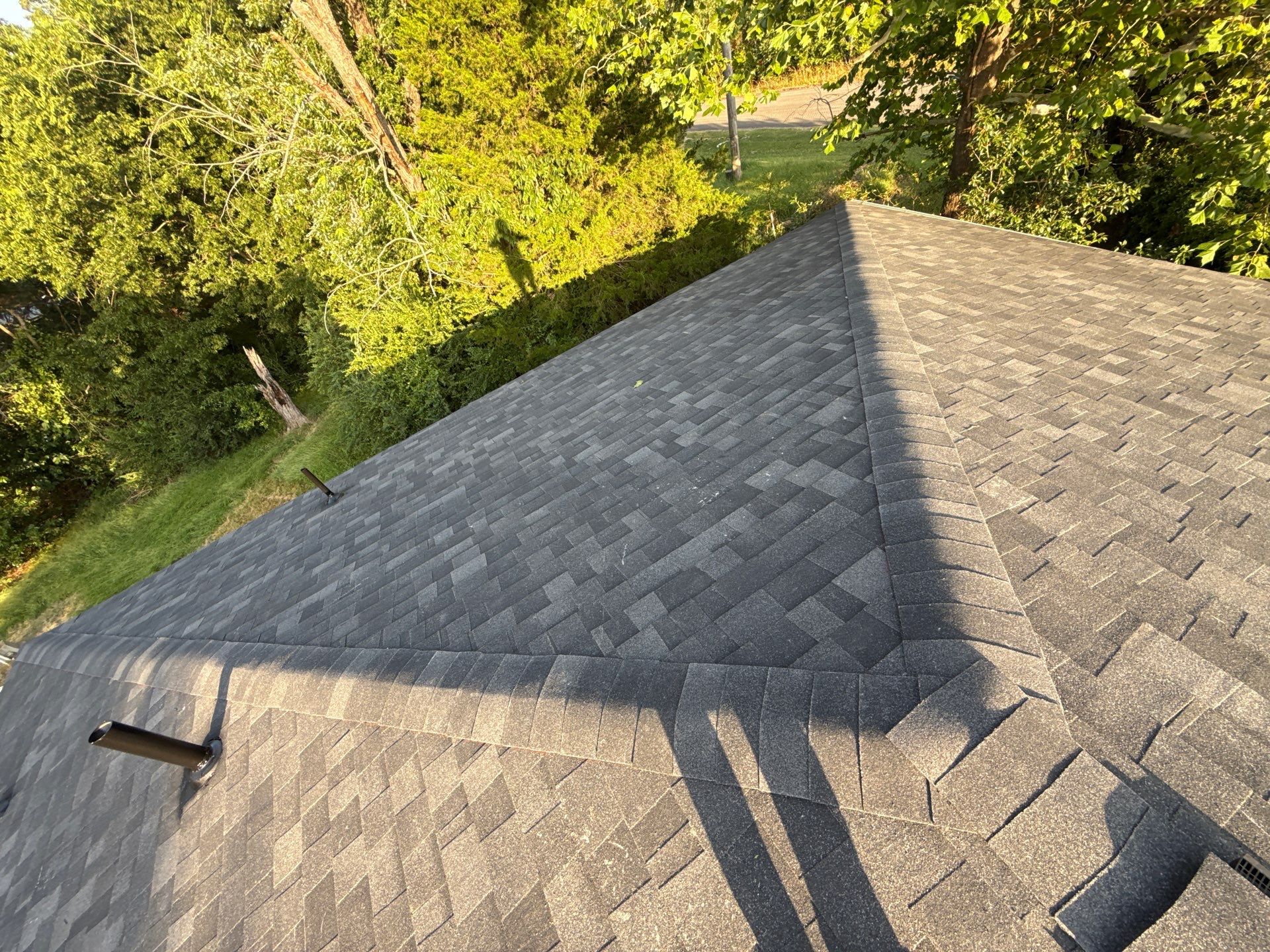2 layers tear off & installation of new architectural shingles. by In & Out Construction & Remodeling, LLC