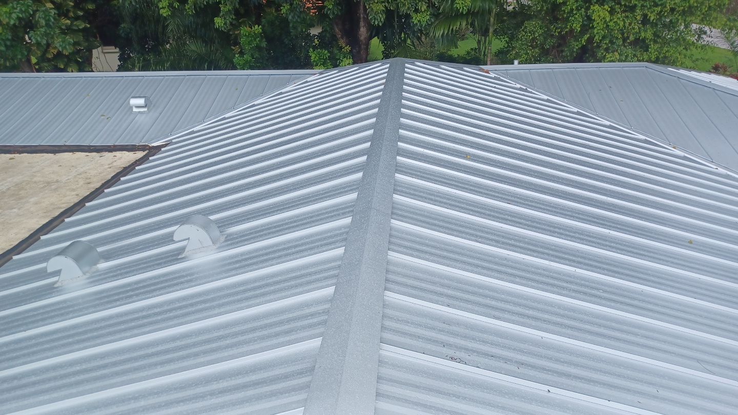 Residential Roofing Installation using 1" Nail strip metal roof by BLUES BROTHERS CONSTRUCTION CORP