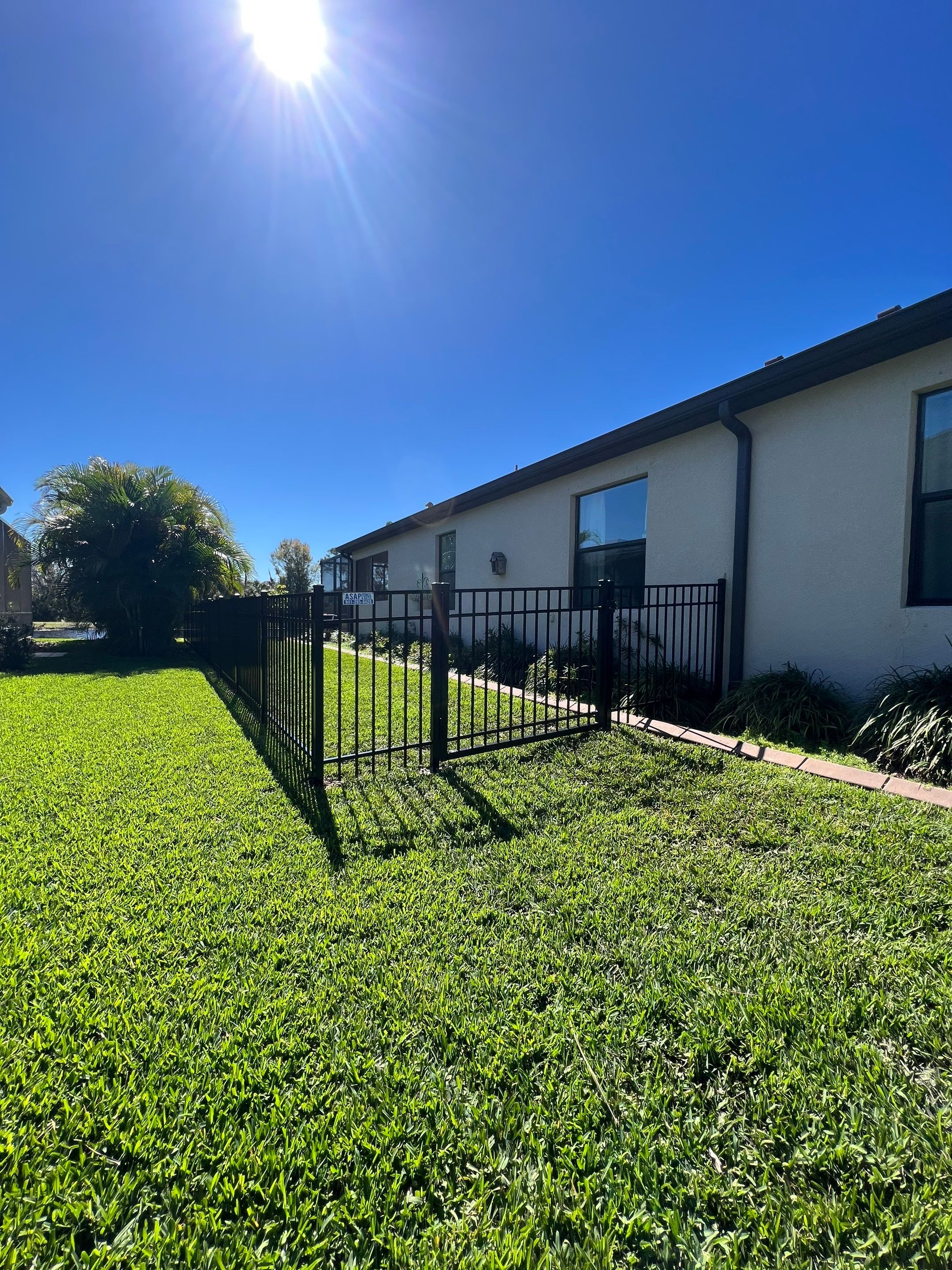 Aluminum Fence Installation using Black 3 Rail Aluminum Fence by Asap fence and gates, LLC