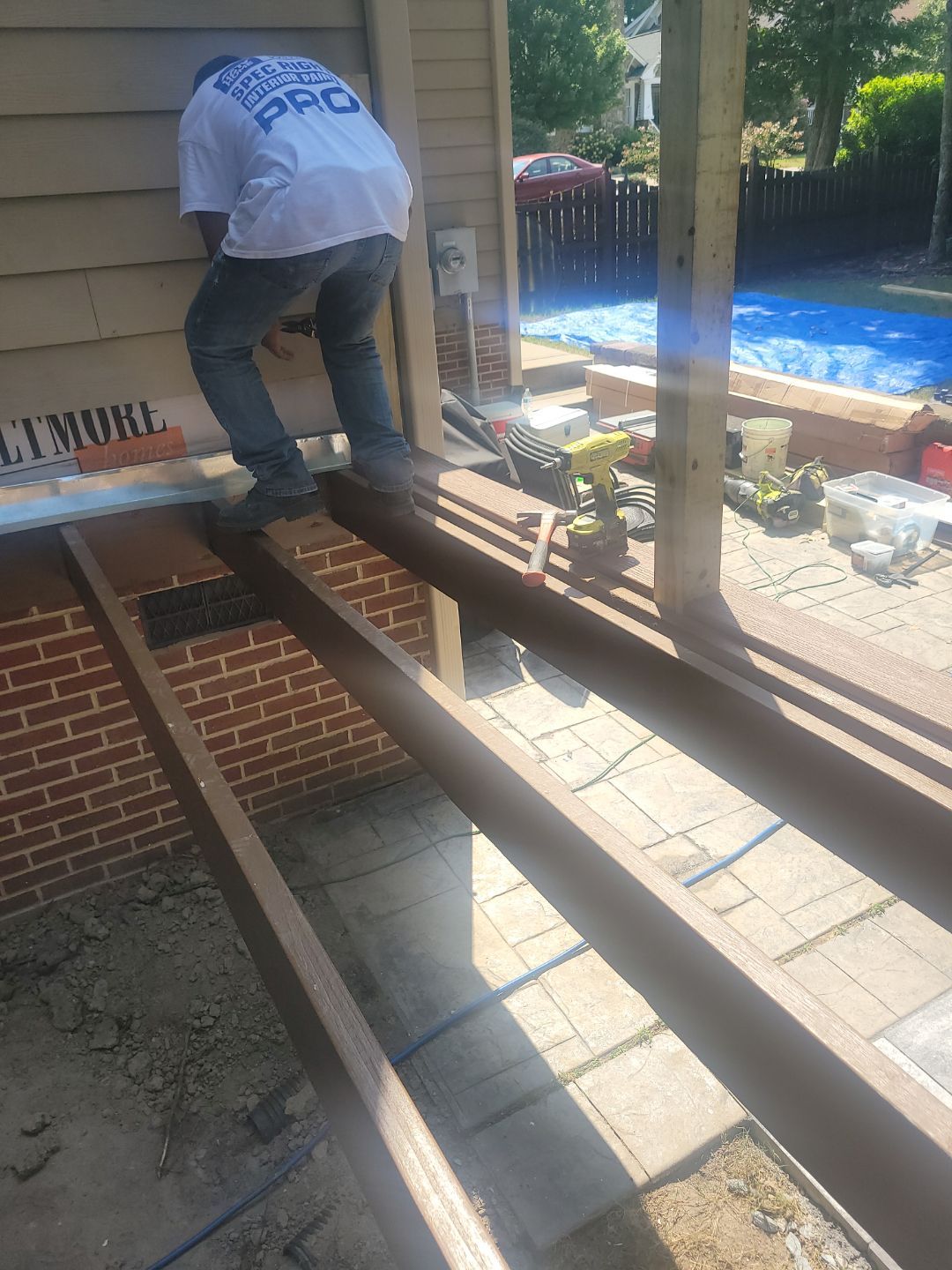 Fuquay-Varina Outdoor Upgrade – Composite Deck & Paved Landing by Elite Remodeling and Design LLC