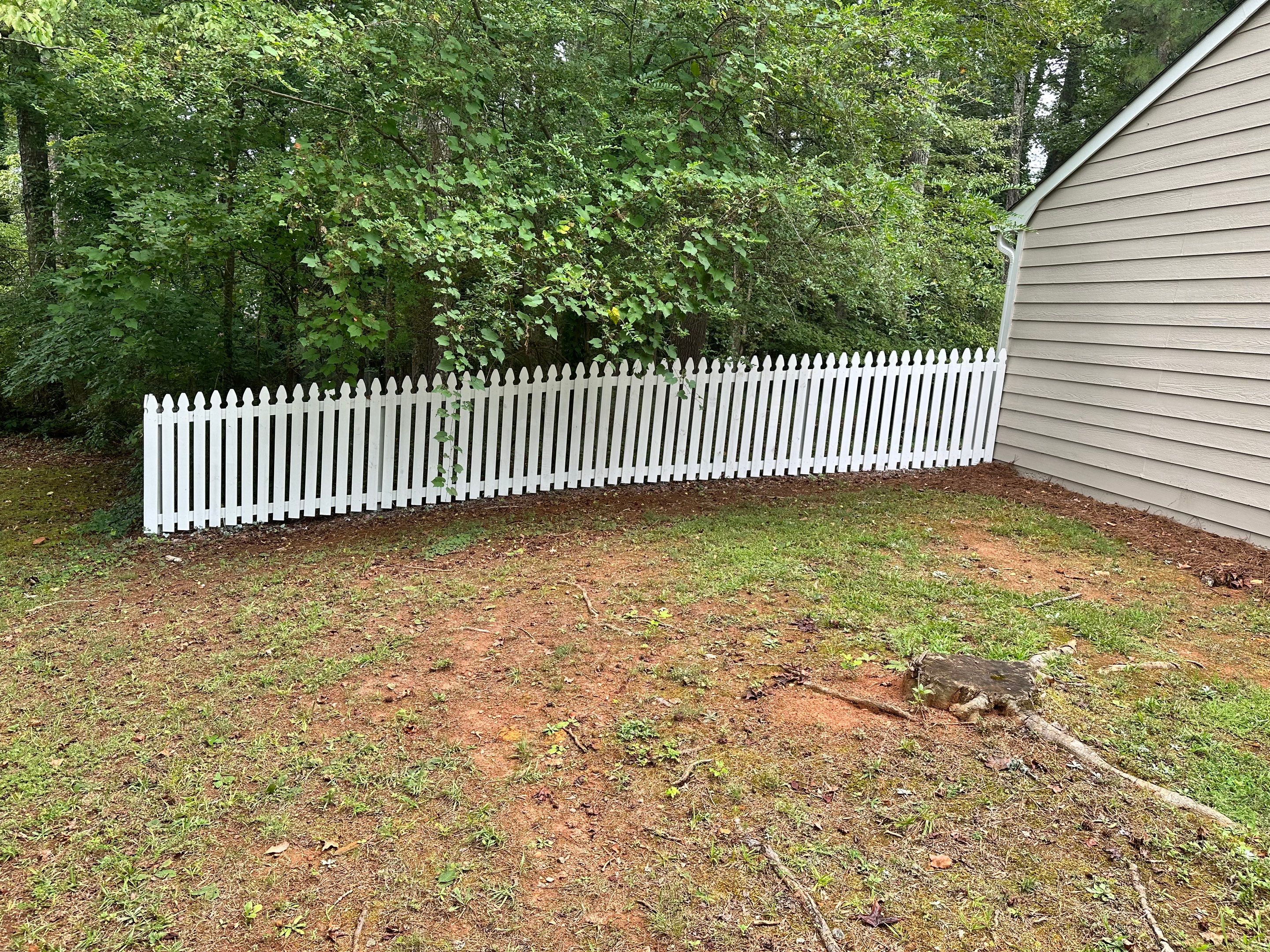 Exterior Siding Painting and Picket Fence Installation in Powder Springs by Swift Home Renovations