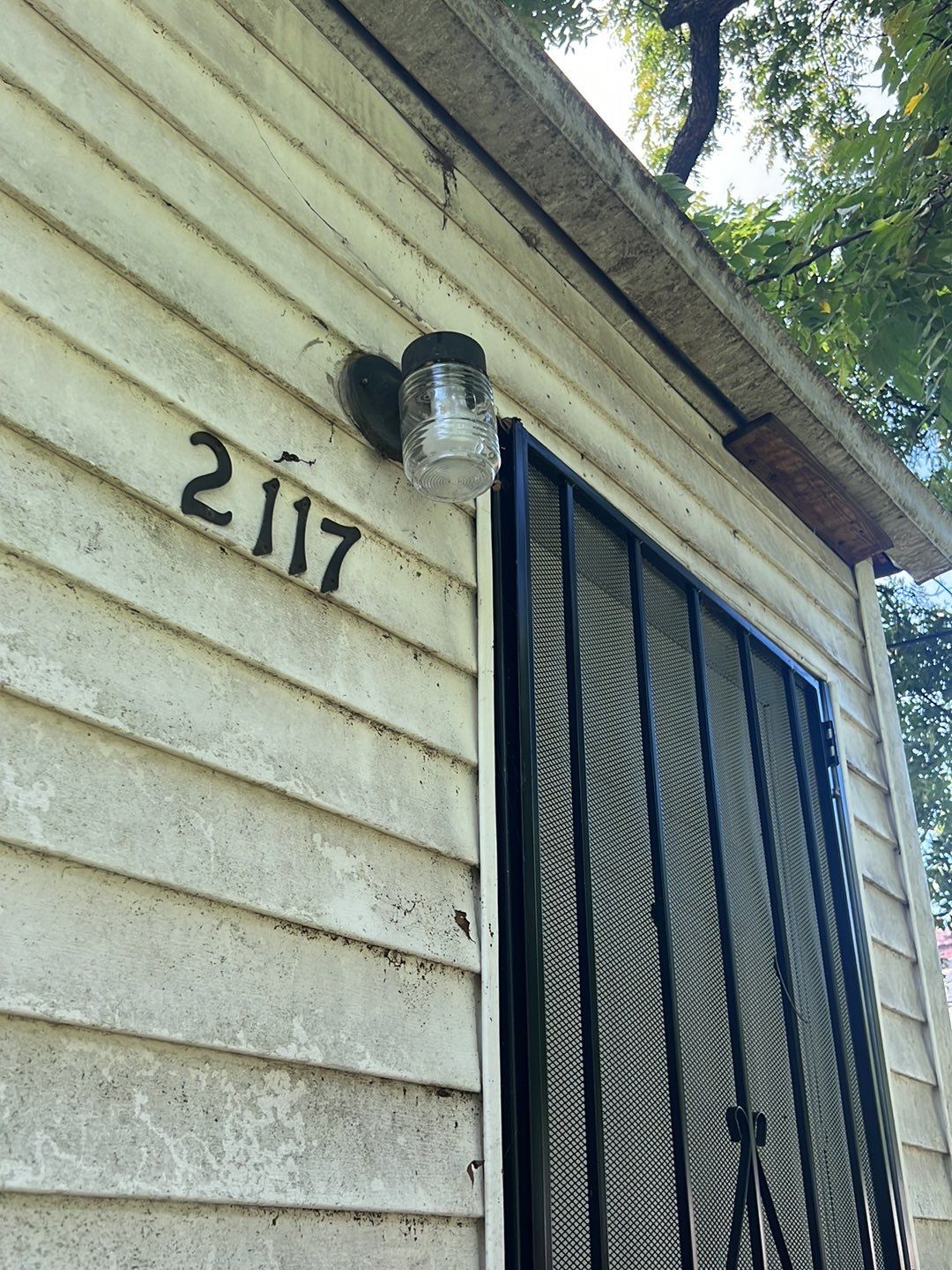 Rental Property Restoration, siding, flooring, gutters, landscaping by Storm Contracting 