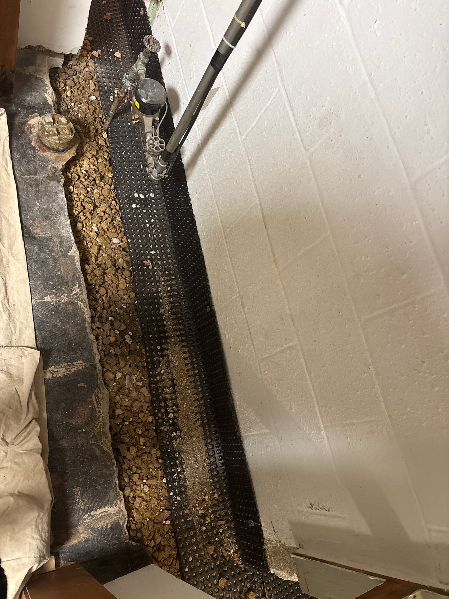 Drain Tile & a Sump Pump for our Property Management Partner by Waterproofing Northeast