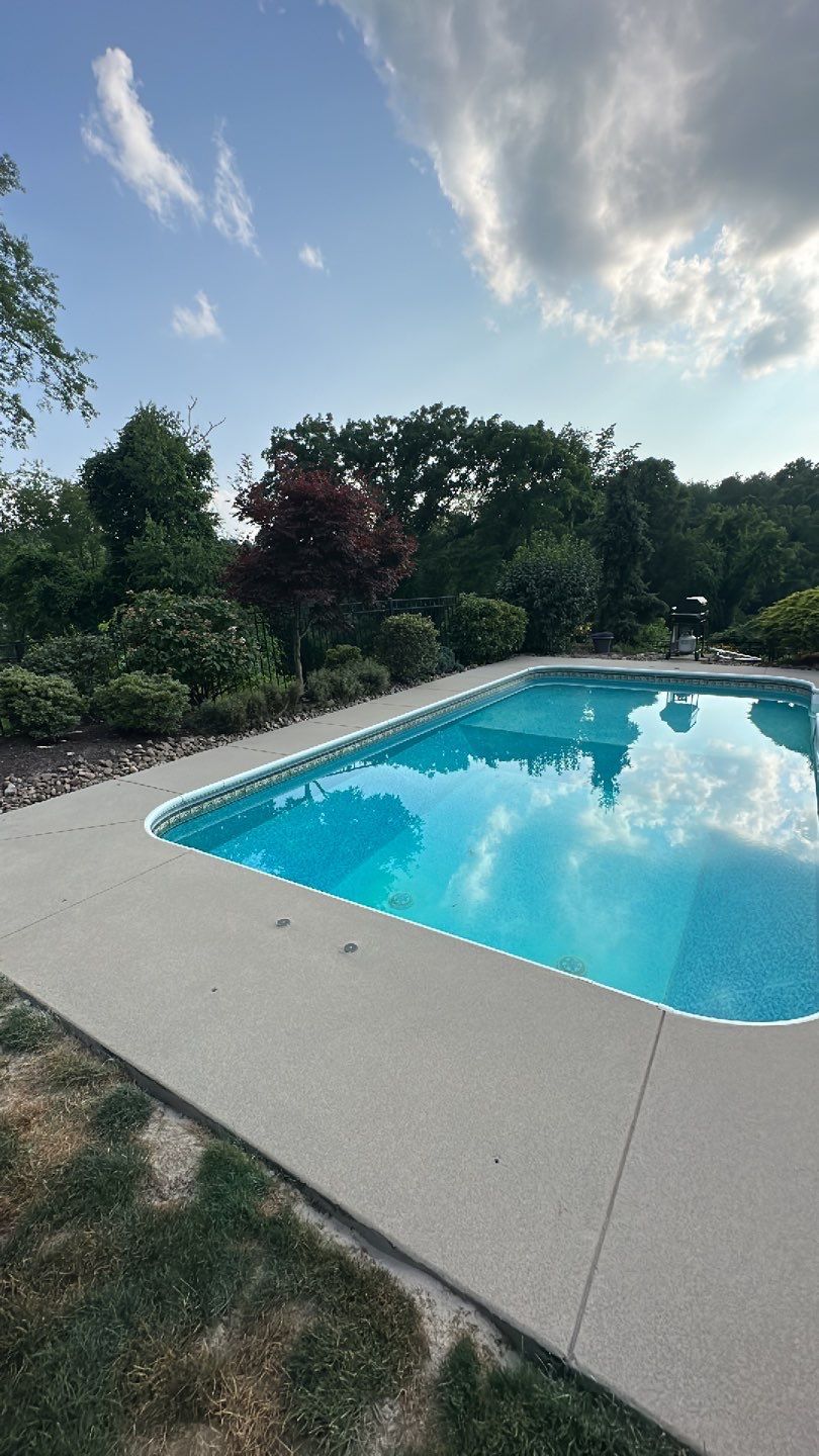 Pool Deck + Driveway + Garage Project in Venetia by Floors in a Day, Inc