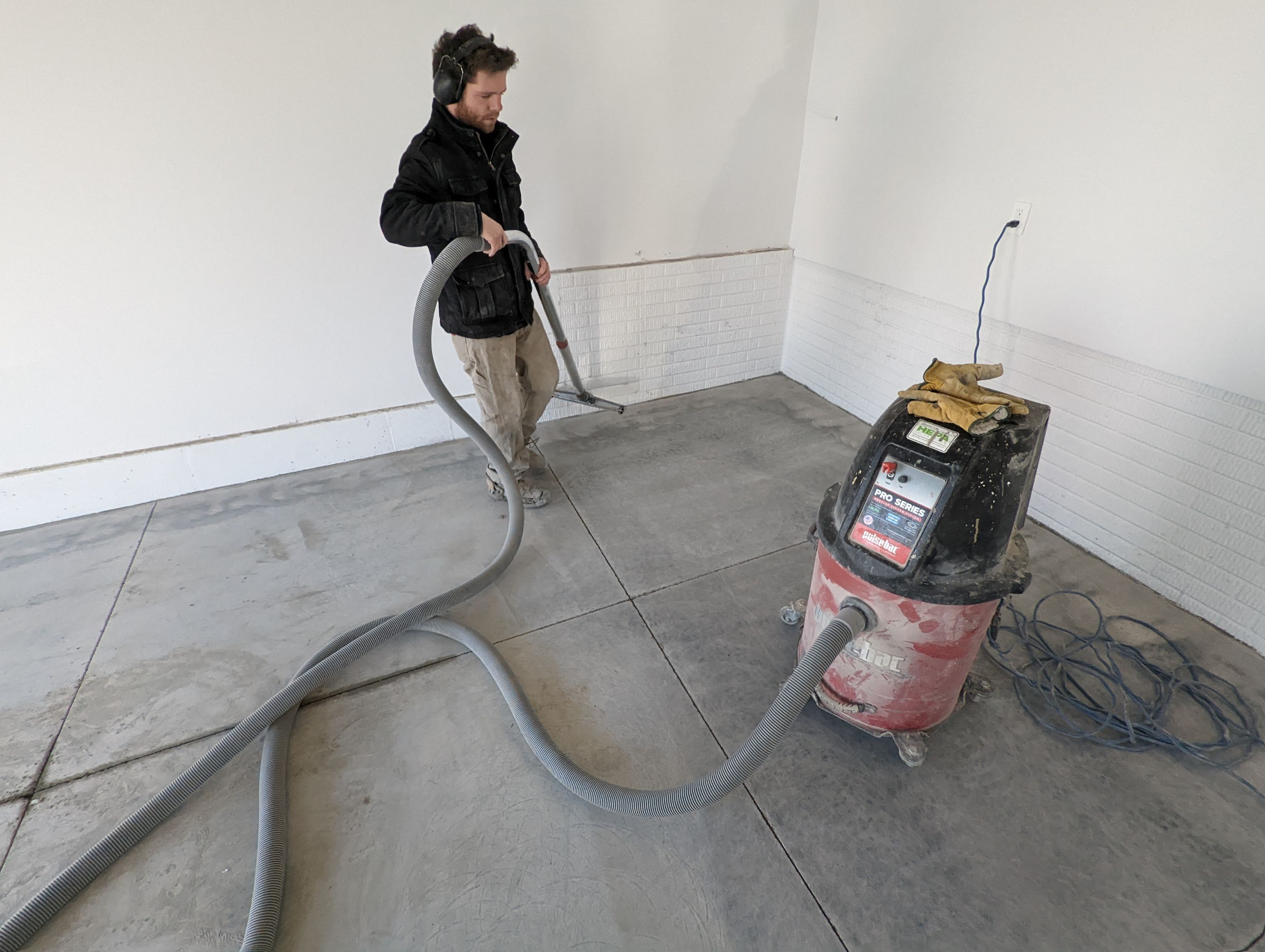 Garage using Sandstone by Select Painting, Coatings & Garage Cabinets